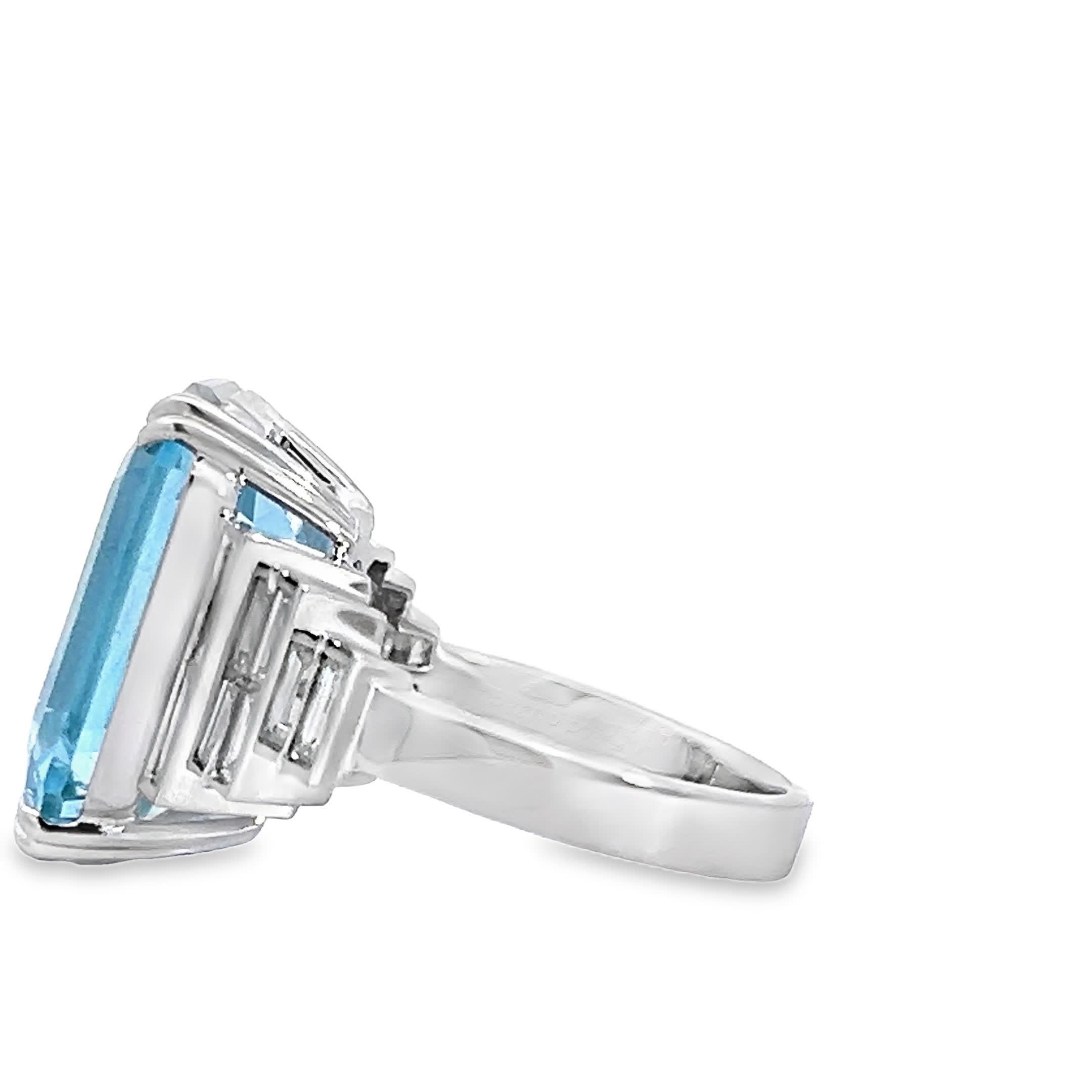 This exquisite aquamarine ring features a striking emerald-cut stone, radiating a serene blue hue that captures the essence of the ocean. Set in a delicate band, it combines elegance with a bold statement, making it perfect for both everyday wear