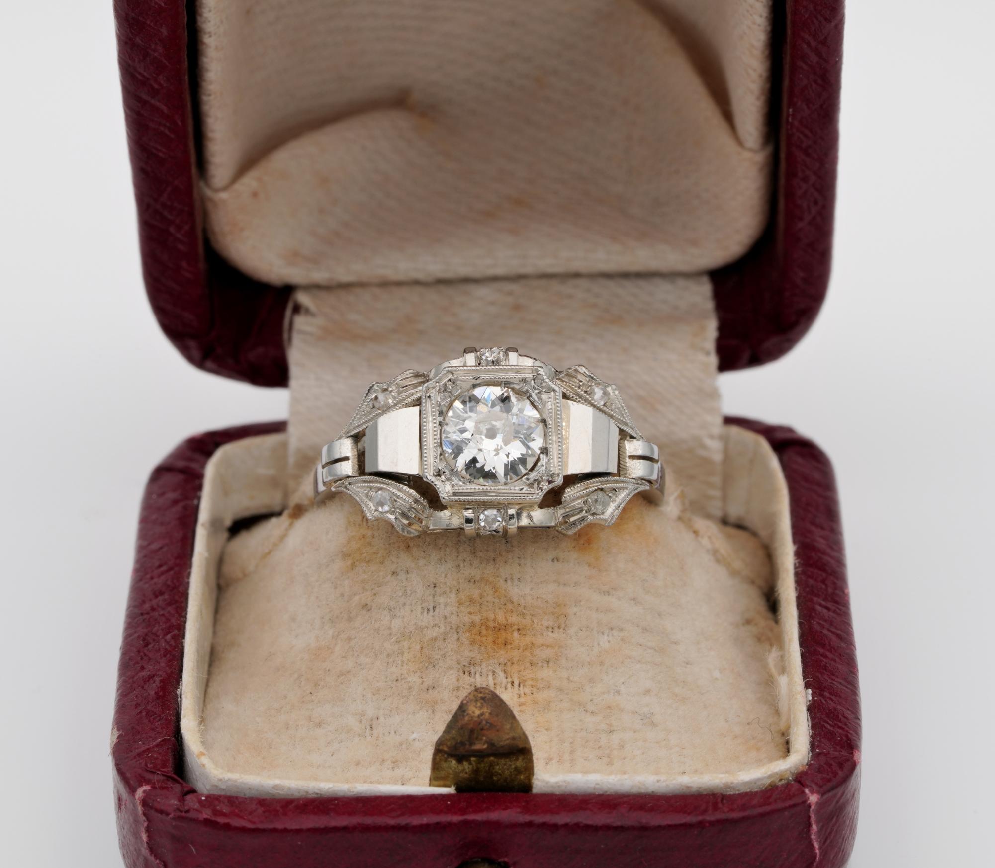 Stepping back into History!

One exquisite and full of the Deco character authentic 1930 ca Diamond solitaire ring
Italian origin bearing the fascist hallmarks of the period
Strong character in design expressing the fashion of the era understated as
