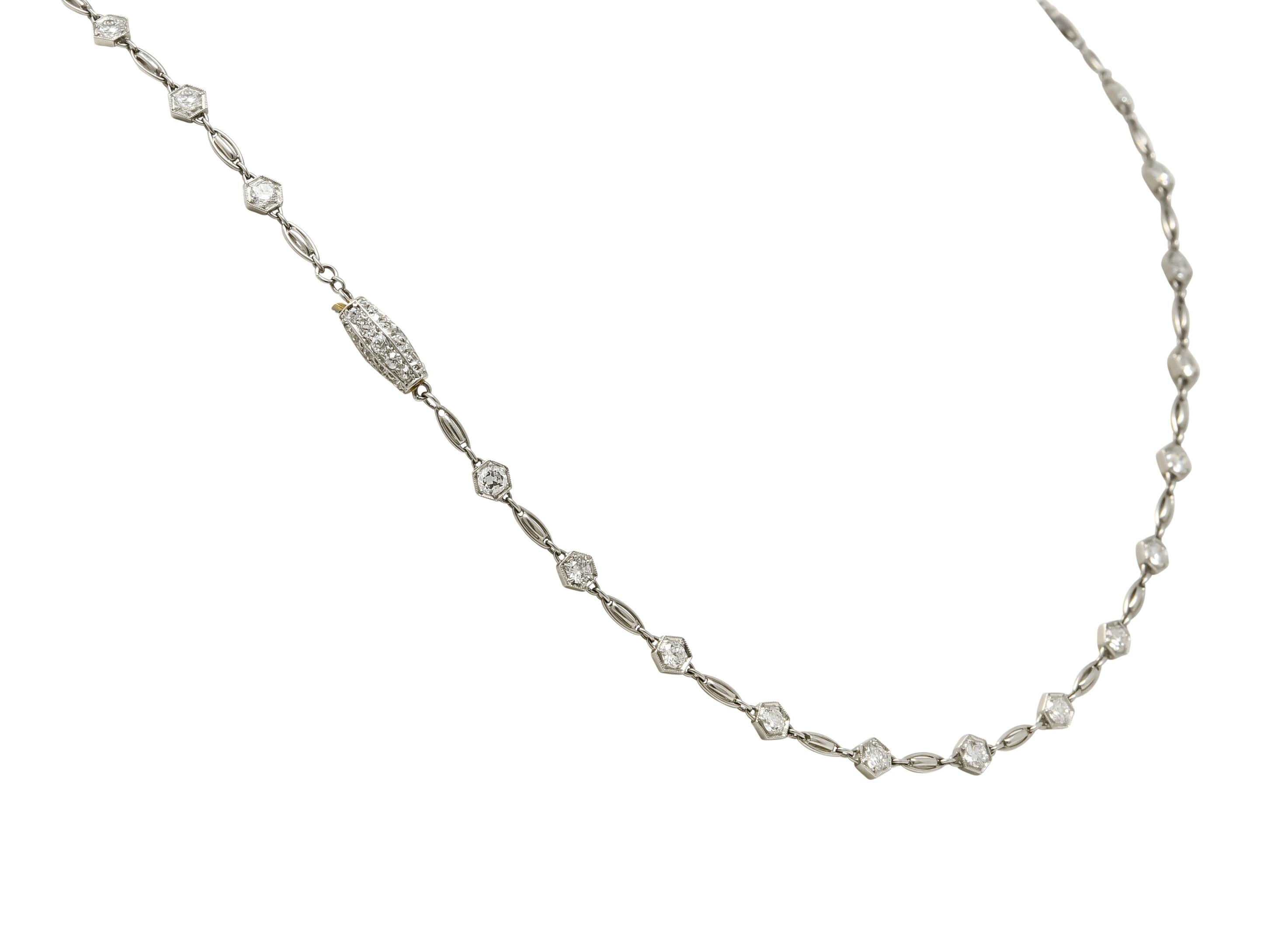 Link style necklace is comprised of elongated cushion links alternating with hexagonal millegrain links, completed by a pavé barrel clasp

Set throughout by old European cut diamonds weighing approximately 6.54 carats total, G/H color and VS