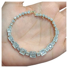 Superbe bracelet tennis Art déco en platine et or jaune 18 carats avec diamants de 5,5 carats