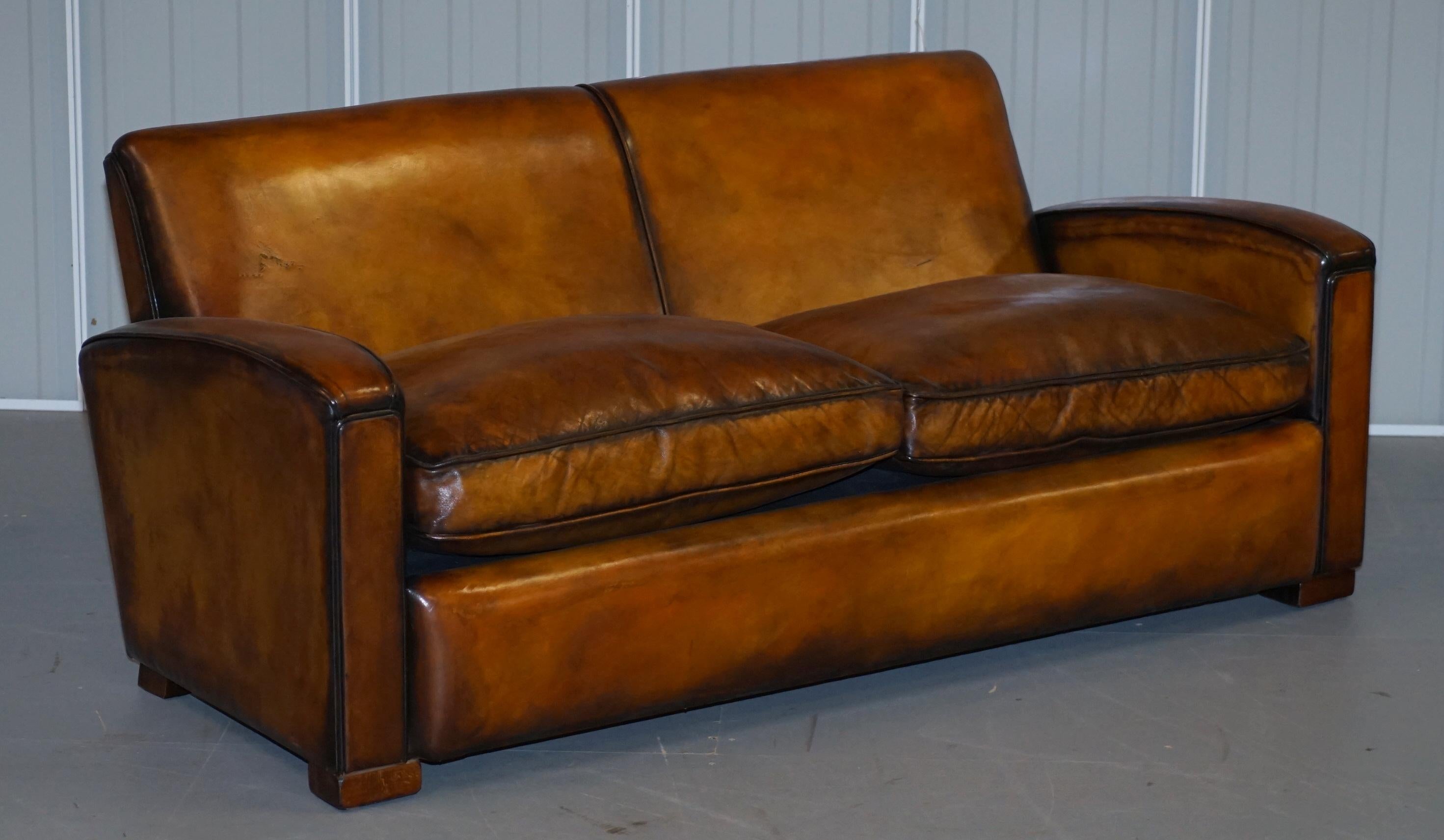 We are delighted to offer for sale this stunning original Art Deco fully restored hand dyed whisky brown leather sofa and armchairs suite

A stunning set that has been restored to a very high standard indeed. The suite has been upholstered with