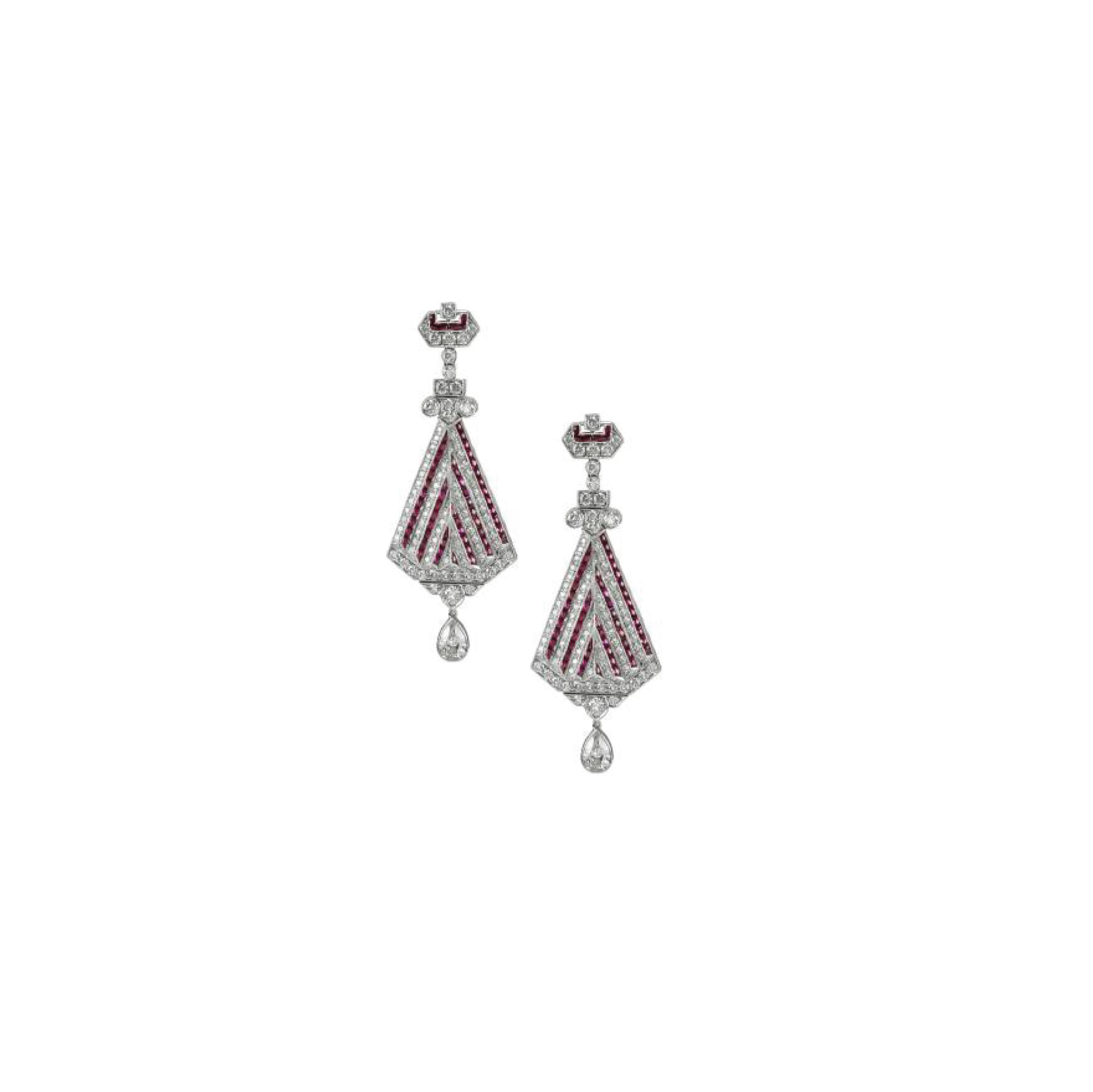 Art Deco inspired earrings set in platinum by Sophia D. that features 2.20 carats of rubies, 2.29 carats of diamonds and 0.97 carats of two round diamonds hanging from the bottom.  

Sophia D by Joseph Dardashti LTD has been known worldwide for 35