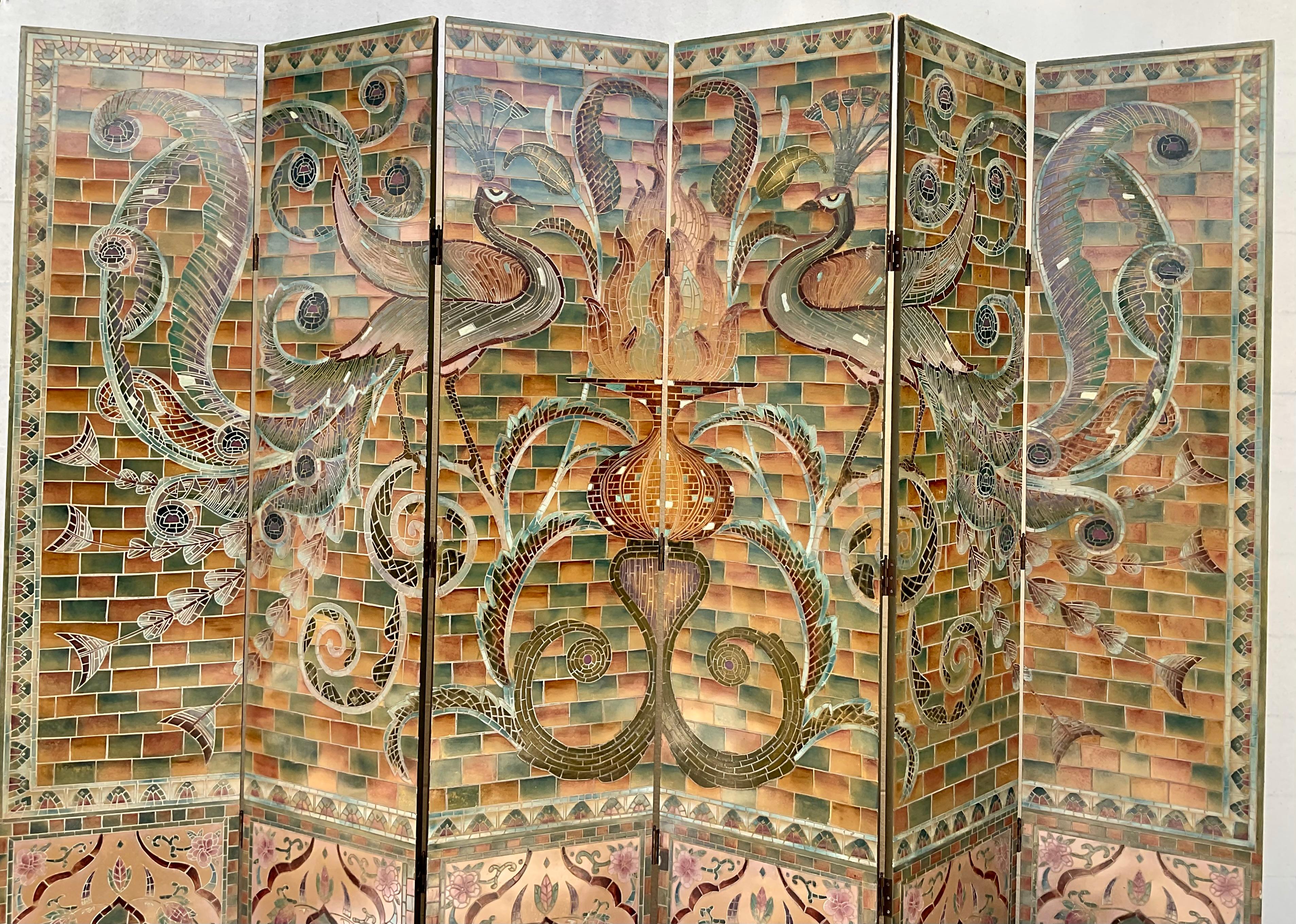 Stunning six panel screen/room divider. Screen is designed to replicate tiles of the art deco era, painted in  rich colors including sage green, rust, burgundy, and pink. Two splendid peacocks in like colors adorn each side of the front of screen.