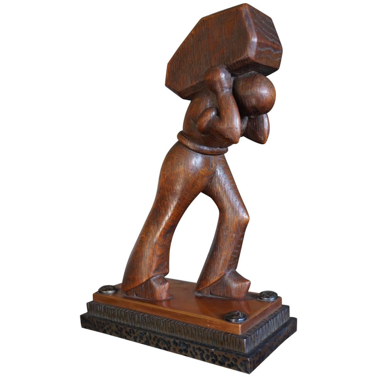 Stunning Art Deco Working Man Carrying a Hay Bale Sculpture on Brass & Iron Base For Sale