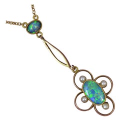 Stunning Art Nouveau 15 Carat Gold Black Opal and Seed Pearl Pendant