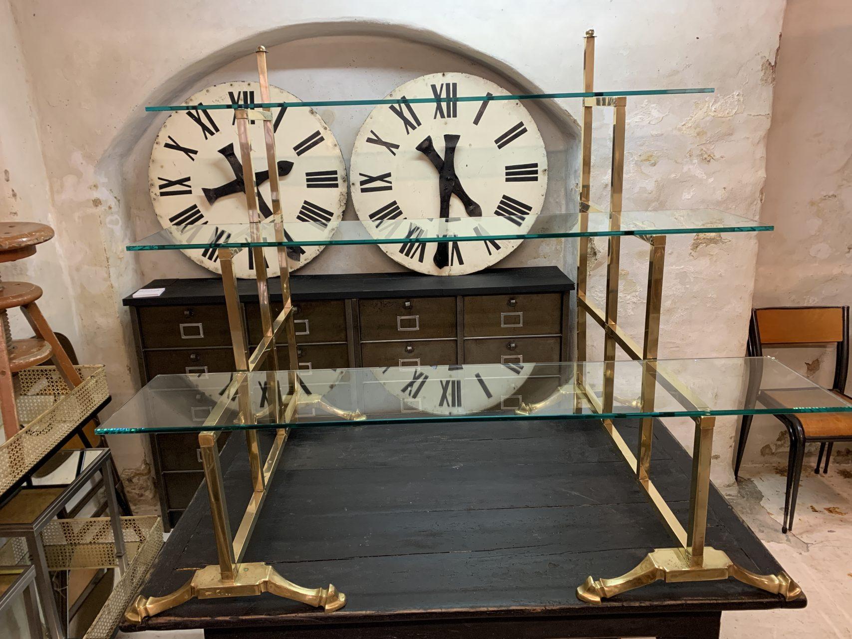 brass and glass shelving