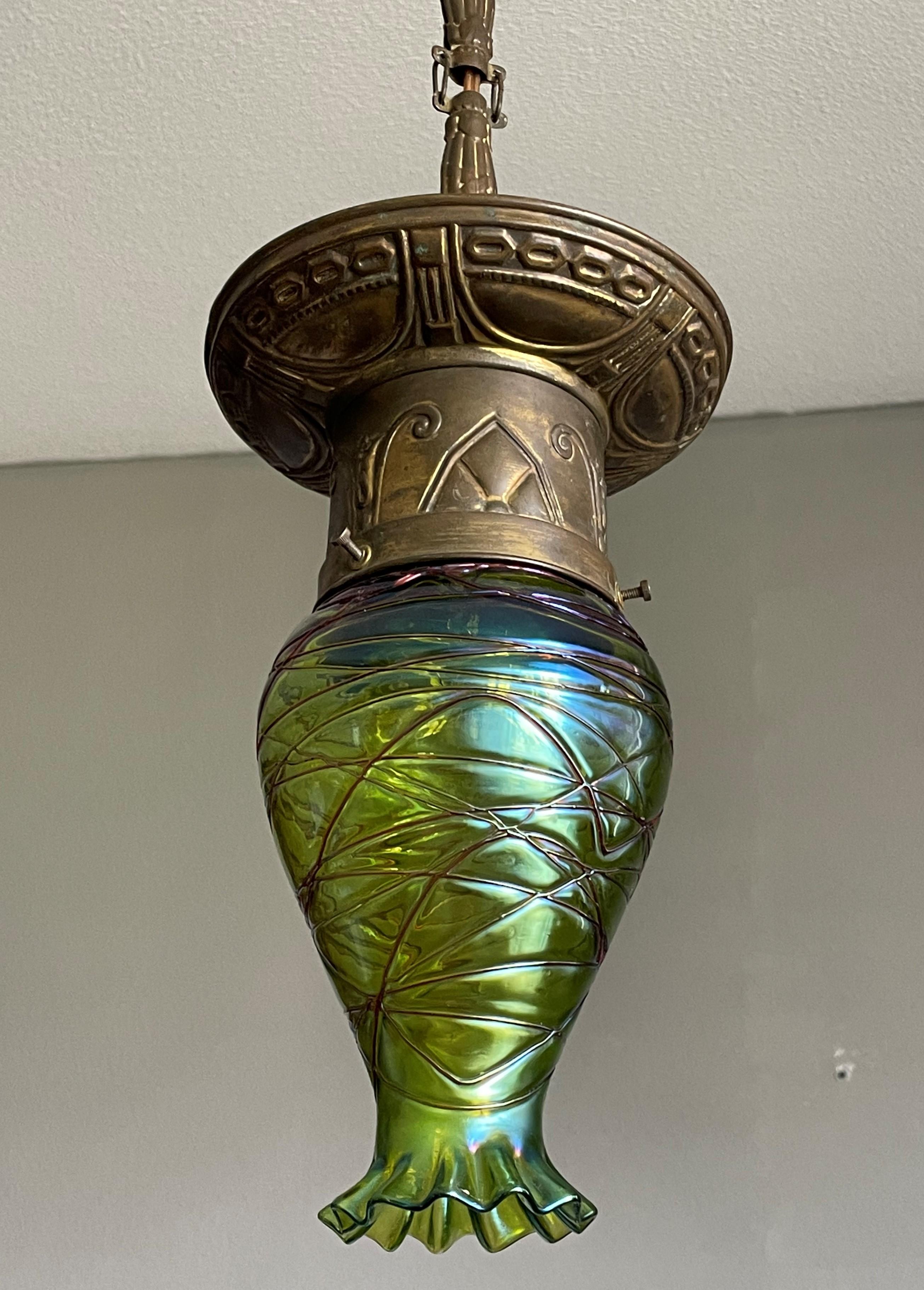 Stunning little antique hallway pendant light for the collectors of rare and beautiful.

This elegant and all handcrafted light fixture is one of the earliest Arts & Crafts lights that we ever had the pleasure of offering. The beautifully
