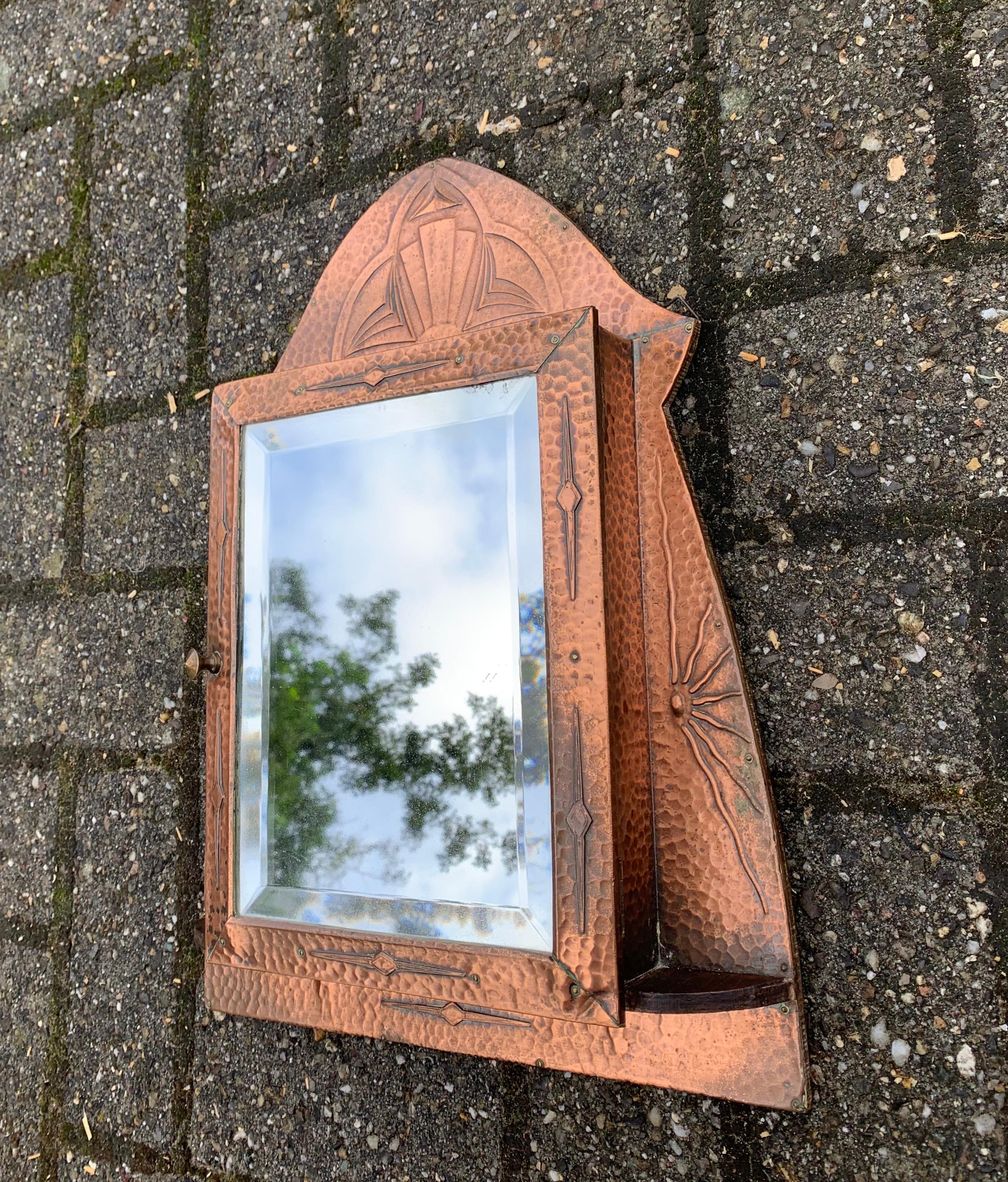 Stunning Arts and Crafts Wall Key Cabinet Embossed Copper and w. Beveled Mirror In Good Condition In Lisse, NL