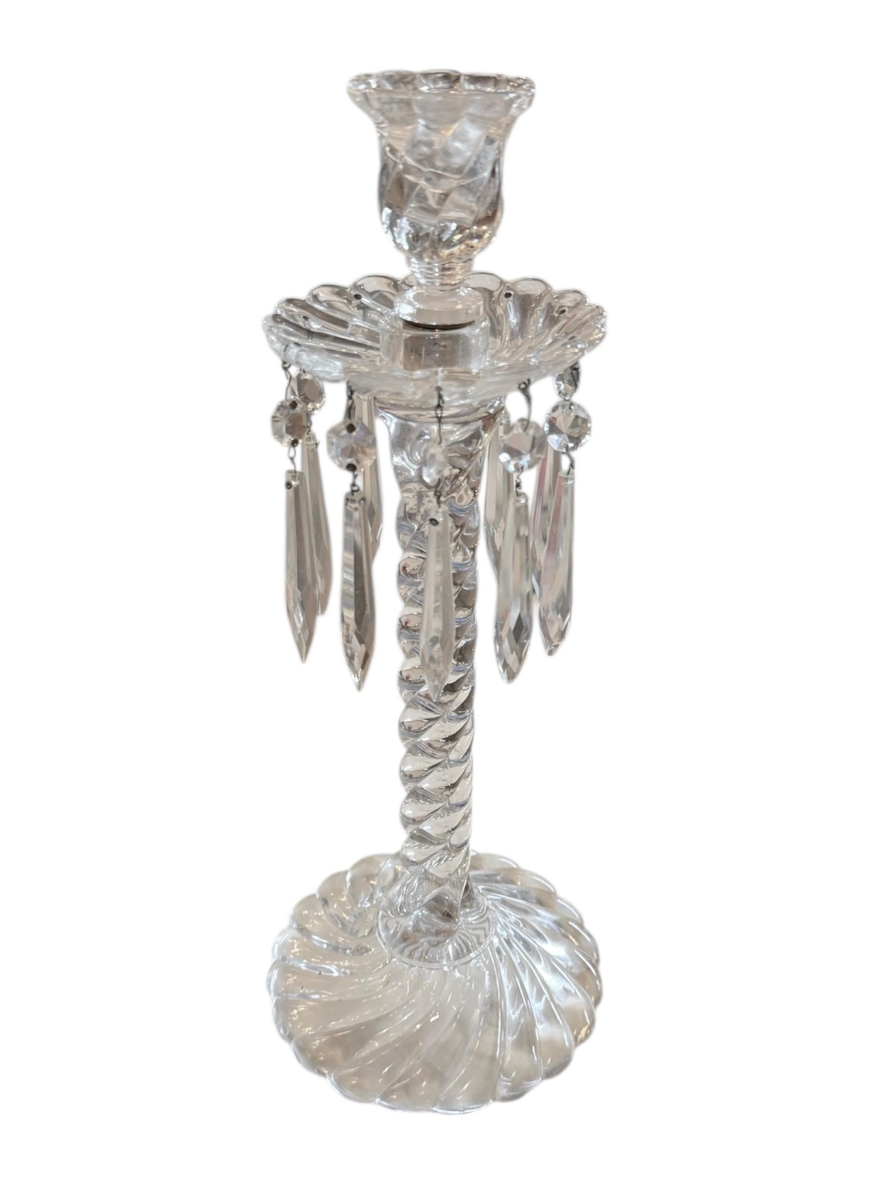 Add a touch of opulence to your collection with this magnificent antique Baccarat luster candlestick. Expertly crafted in fine crystal, this candlestick showcases Baccarat’s legendary artistry and attention to detail.