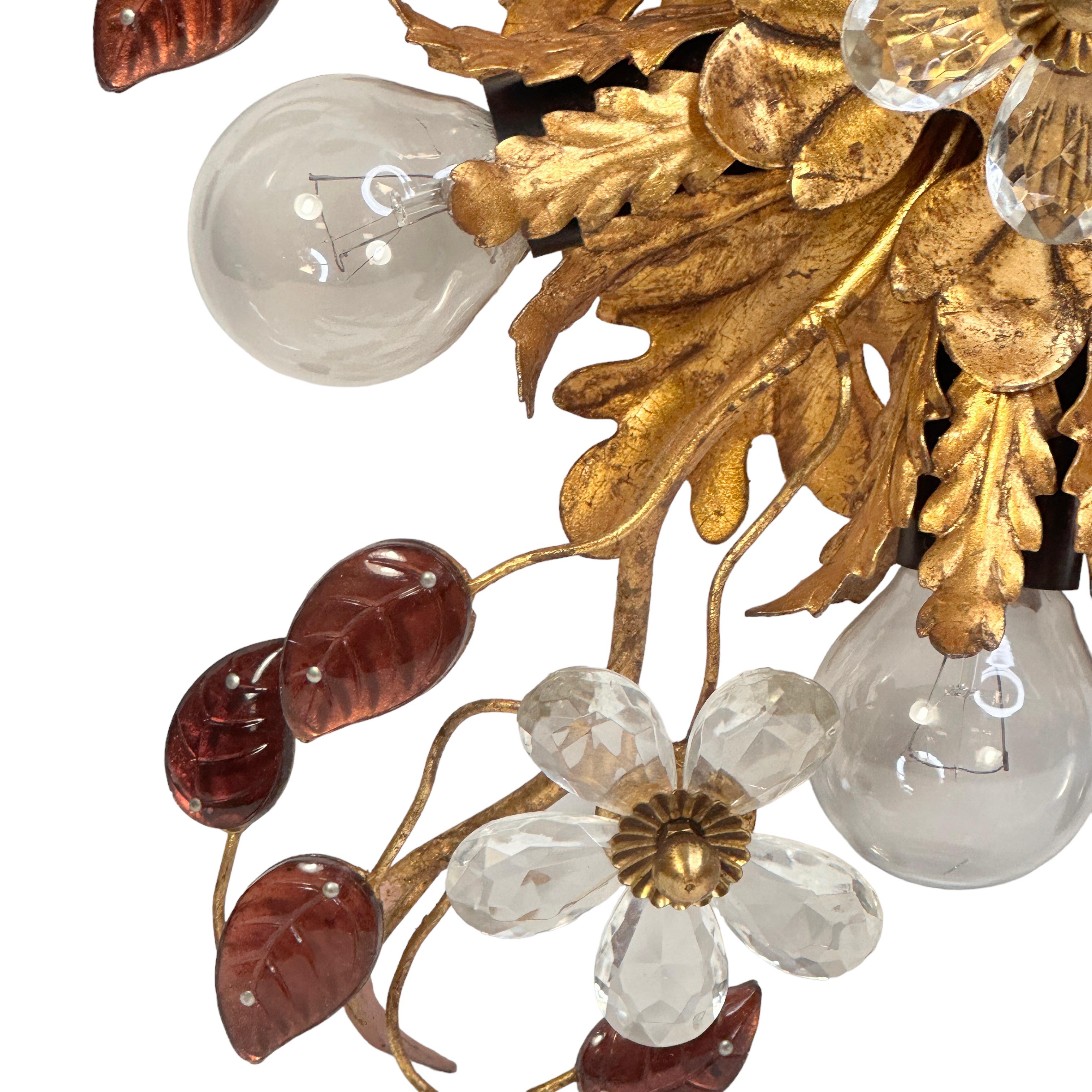 Add a touch of opulence to your home with this charming flush mount light. Perfect stunning gilt acanthus leaf design with clear Murano glass flowers and colored Murano glass leaves on fine gilt stems, to enhance any chic or eclectic home. We'd love