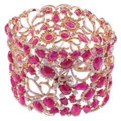 Stunning Band Bracelet with Ruby and Diamonds in a Flowers Design