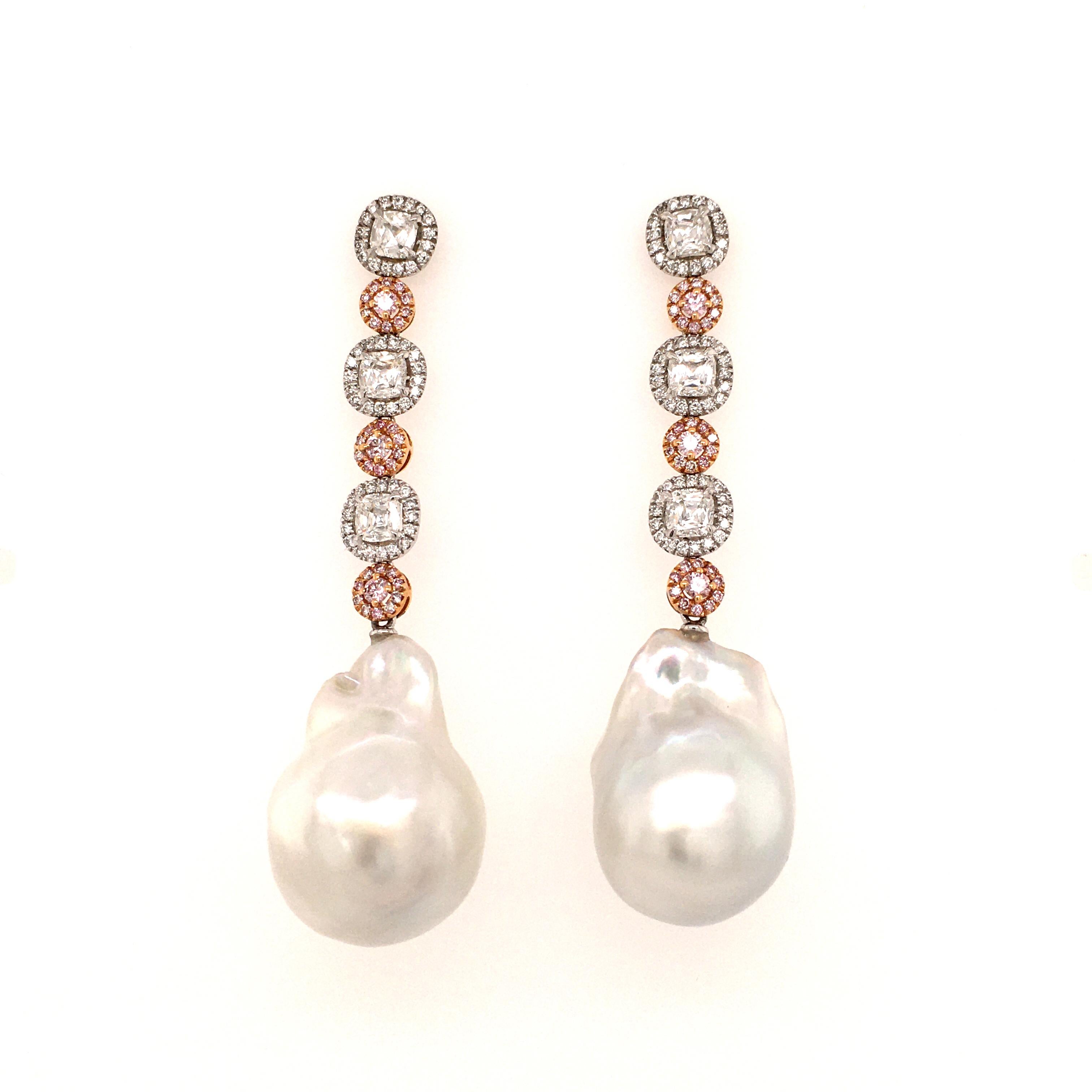 These beautifully crafted earstuds feature two unique baroque shaped South Sea cultured Pearls measuering approx 24.1 x 17.8 and 23.4 x 16.6 mm. Mounting in platinum 950 and rose gold 750, set with 6 cushion shaped diamonds and six brilliant shaped