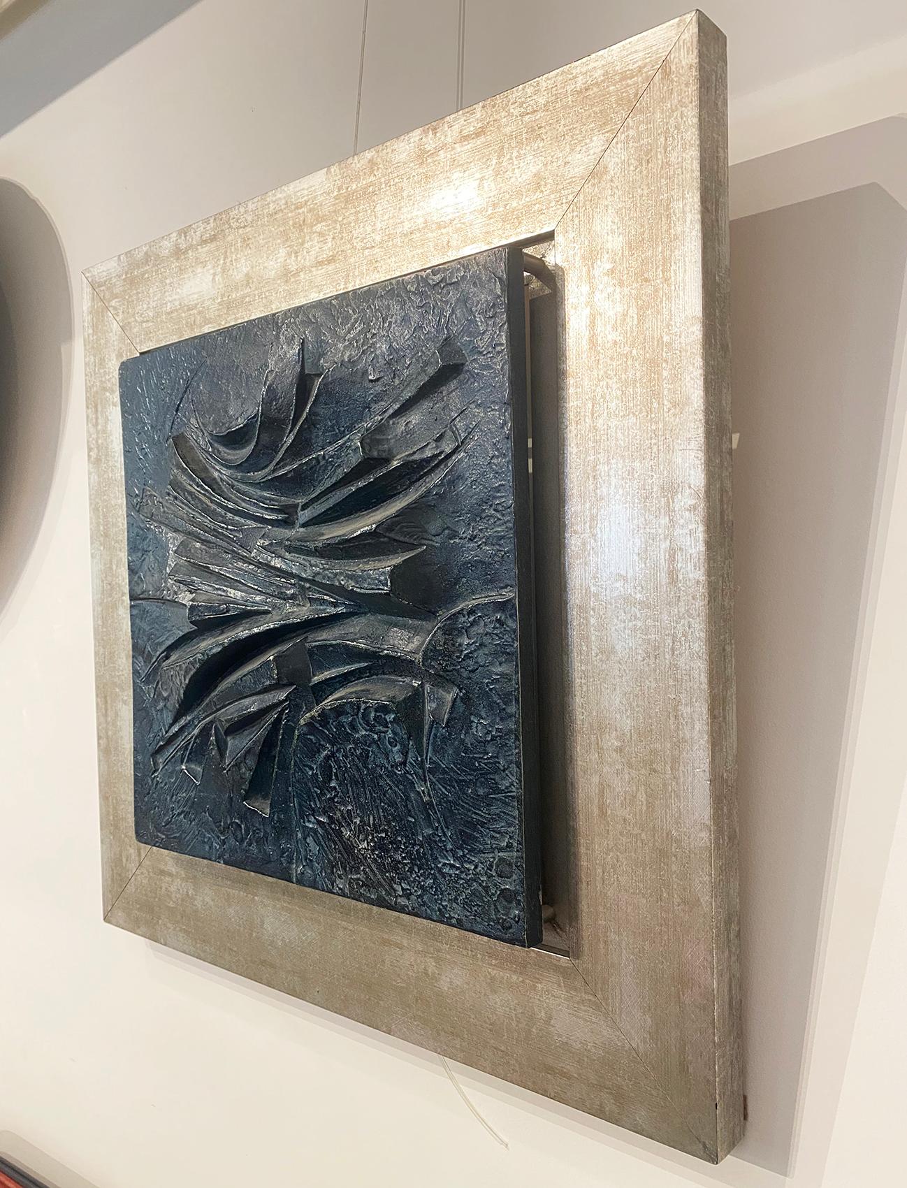 Sculpture by Alicia Penalba, bas relief in metal alloy, signed Alicia Penalba, dedicated from the back, dim: 60 x 60 cm. 
Penalba arrived in Paris in 1948, with a scholarship from the French government and was awarded the engraving medal for