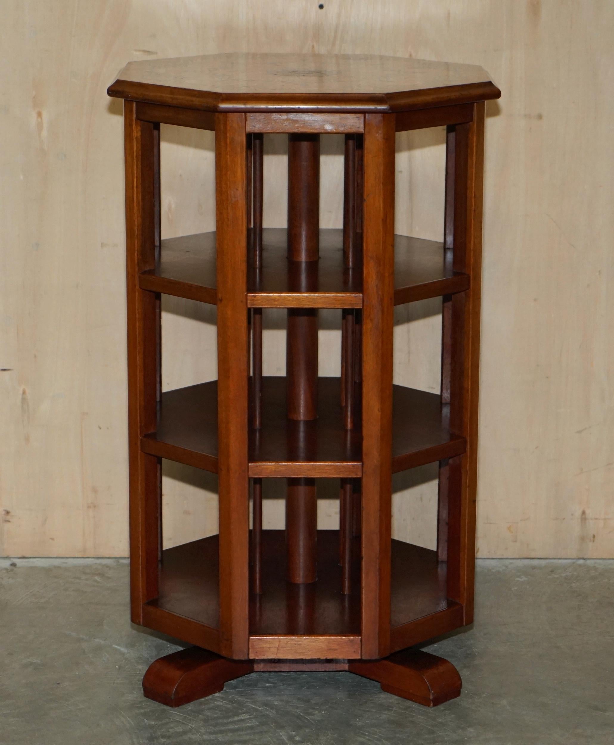 We are delighted to offer for sale this very fine and highly collectable Octagonal revolving book table with beautifully inlaid top 

A very good looking well made and decorative piece, this is the only one I have ever seen with this type of inlay