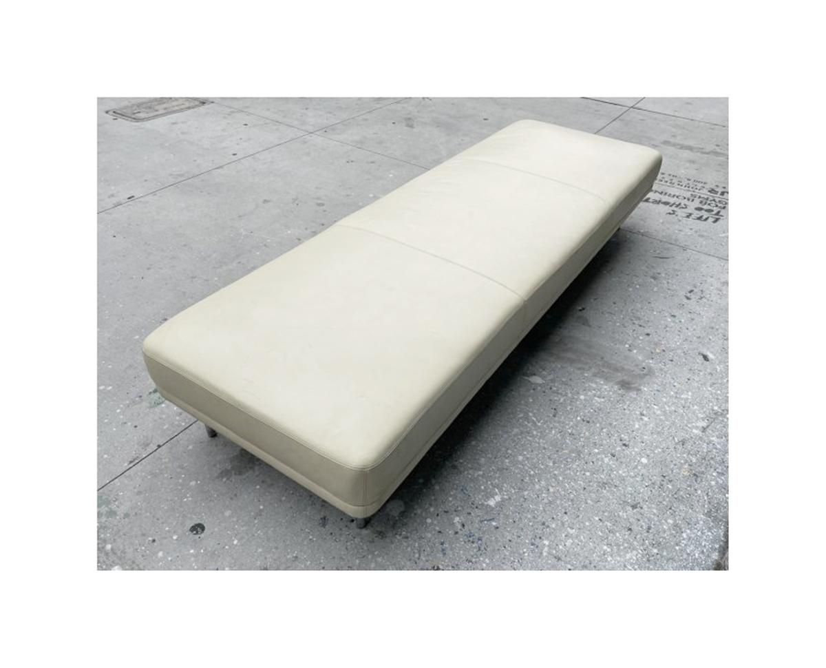 Stunningly beautiful bench having leather upholstery and rounded stainless still legs.

The piece can double as a day bed since is almost 30 inches wide.

Beautiful lines, perfect for the bedroom, living room, den or office.

Measurements:
90