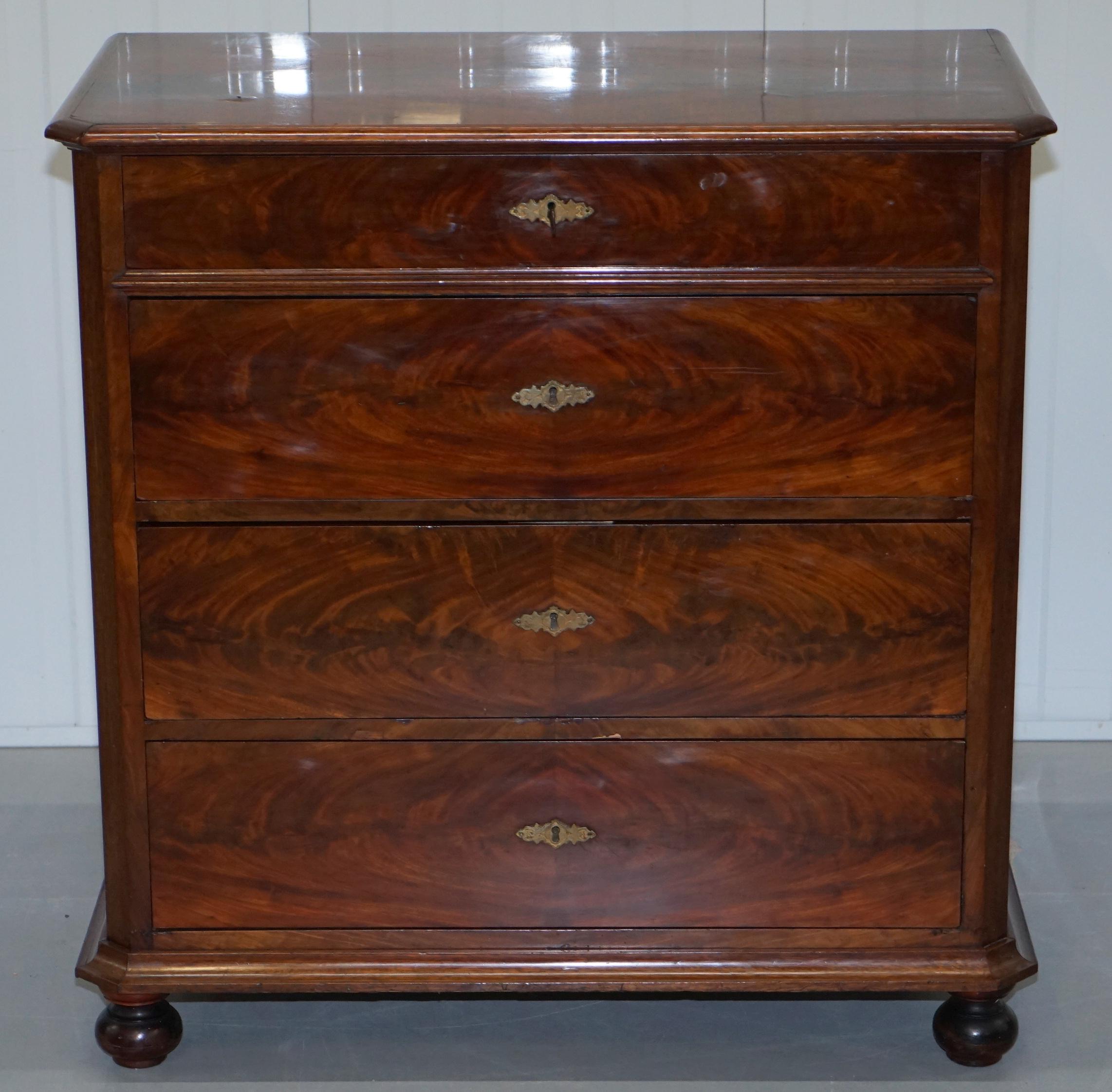 We are delighted to offer for sale this lovely circa 1820 flamed mahogany Biedermeier chest of drawers

A good looking and well-made chest with a rich warm patina to the timber, the one key which is original operates all locks, these types of