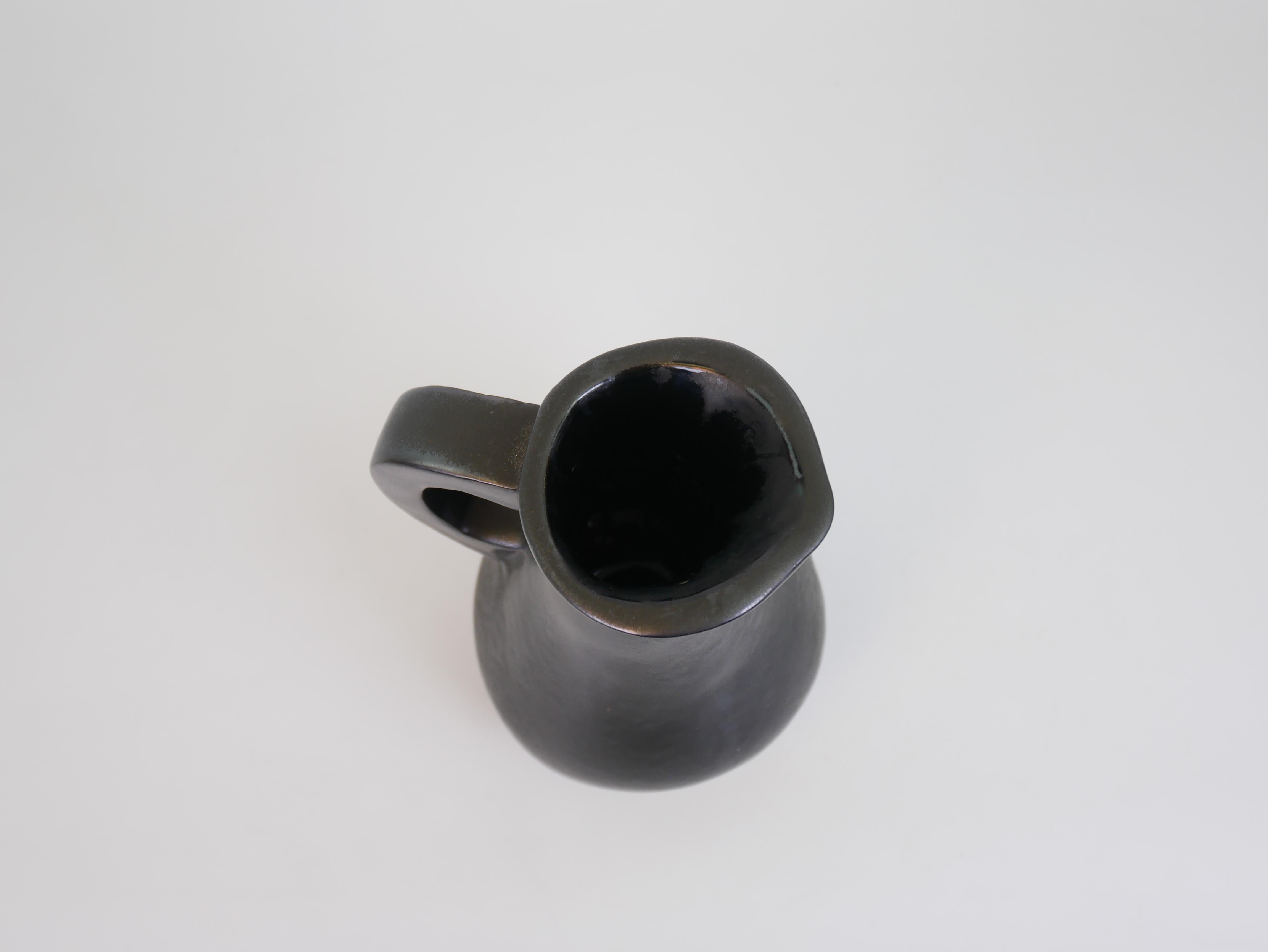 Stunning black ceramic pitcher in the style of Georges Jouve circa 1950 For Sale 8