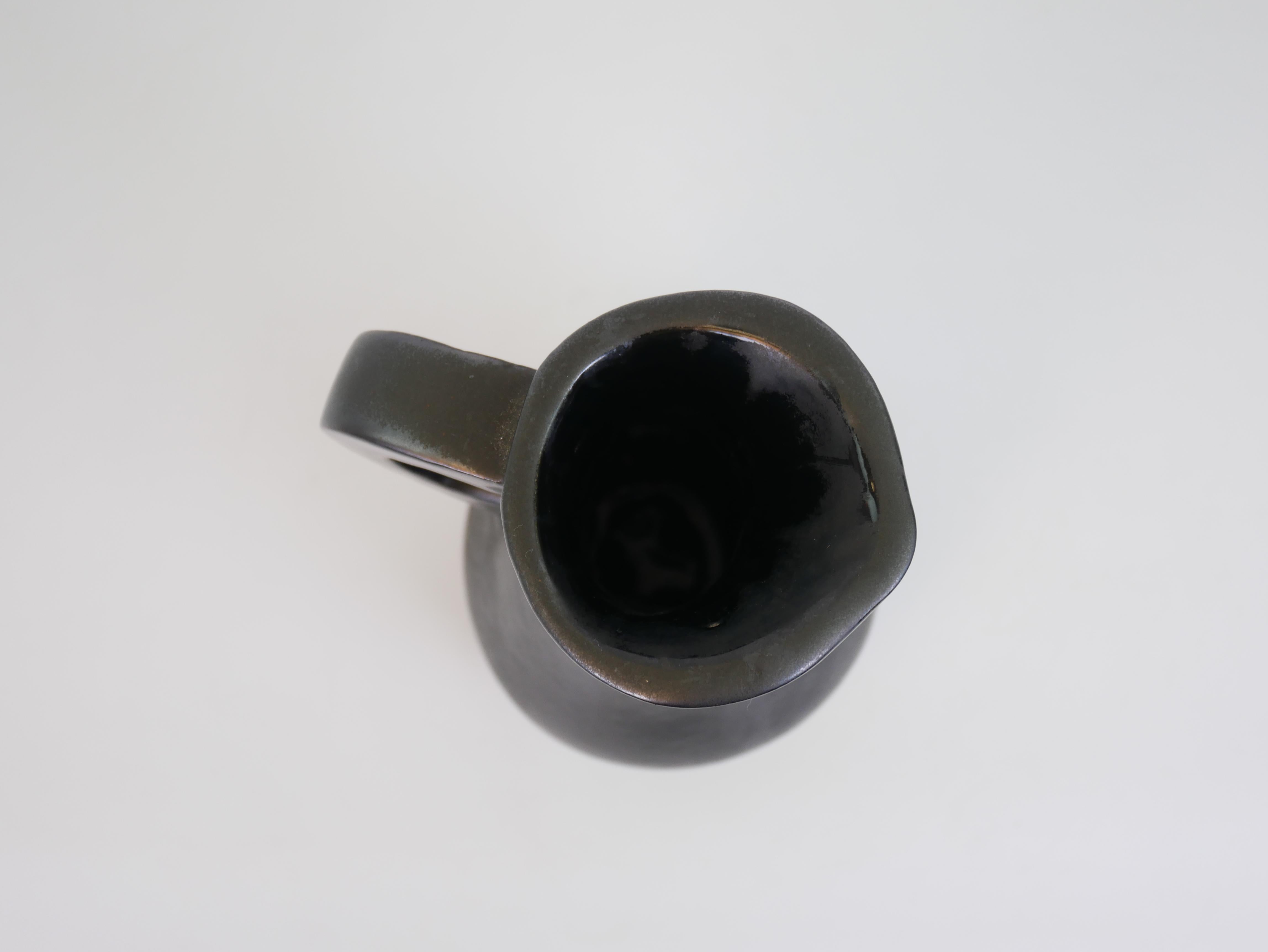 Stunning black ceramic pitcher in the style of Georges Jouve circa 1950 For Sale 9