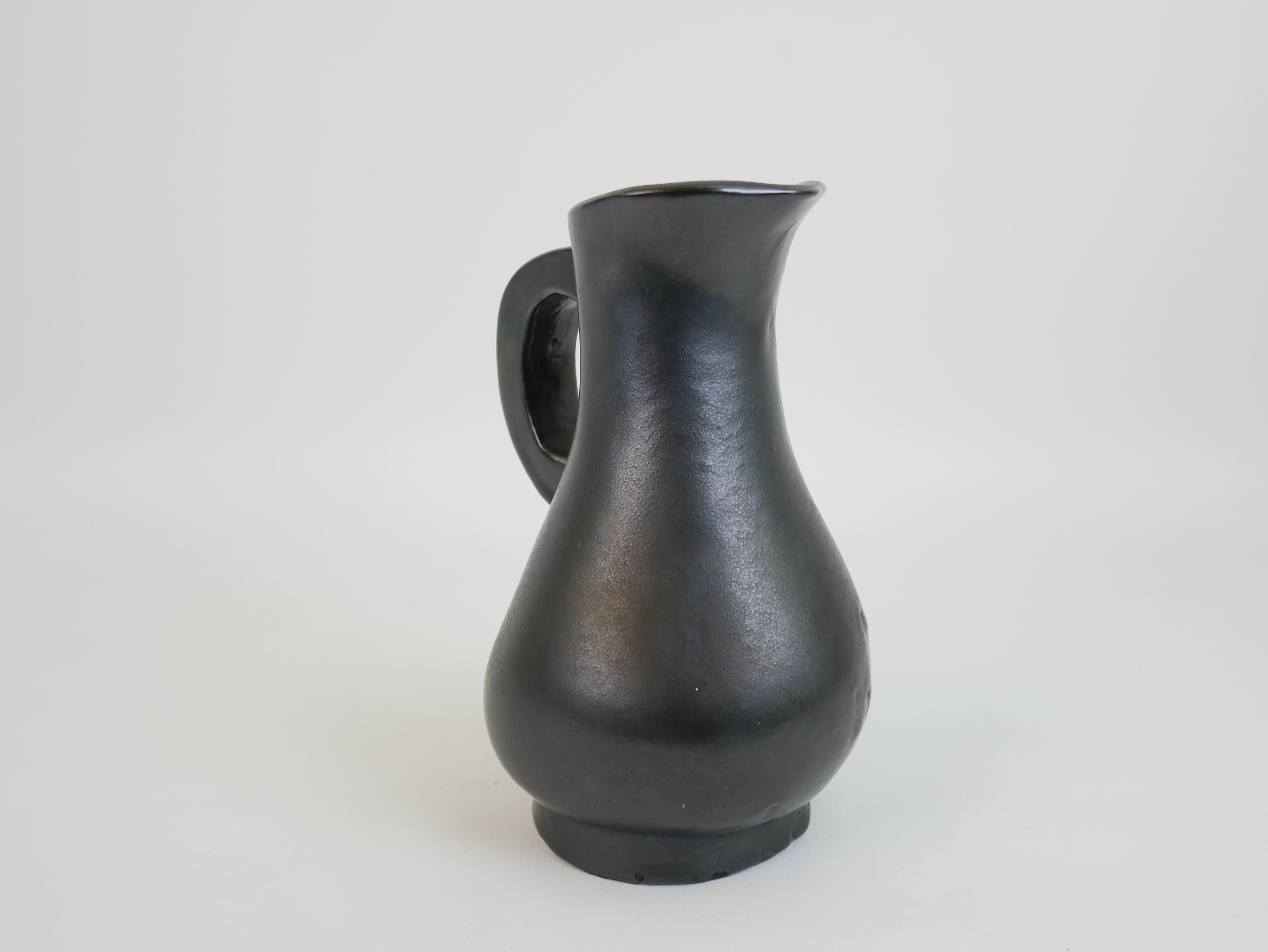 European Stunning black ceramic pitcher in the style of Georges Jouve circa 1950 For Sale