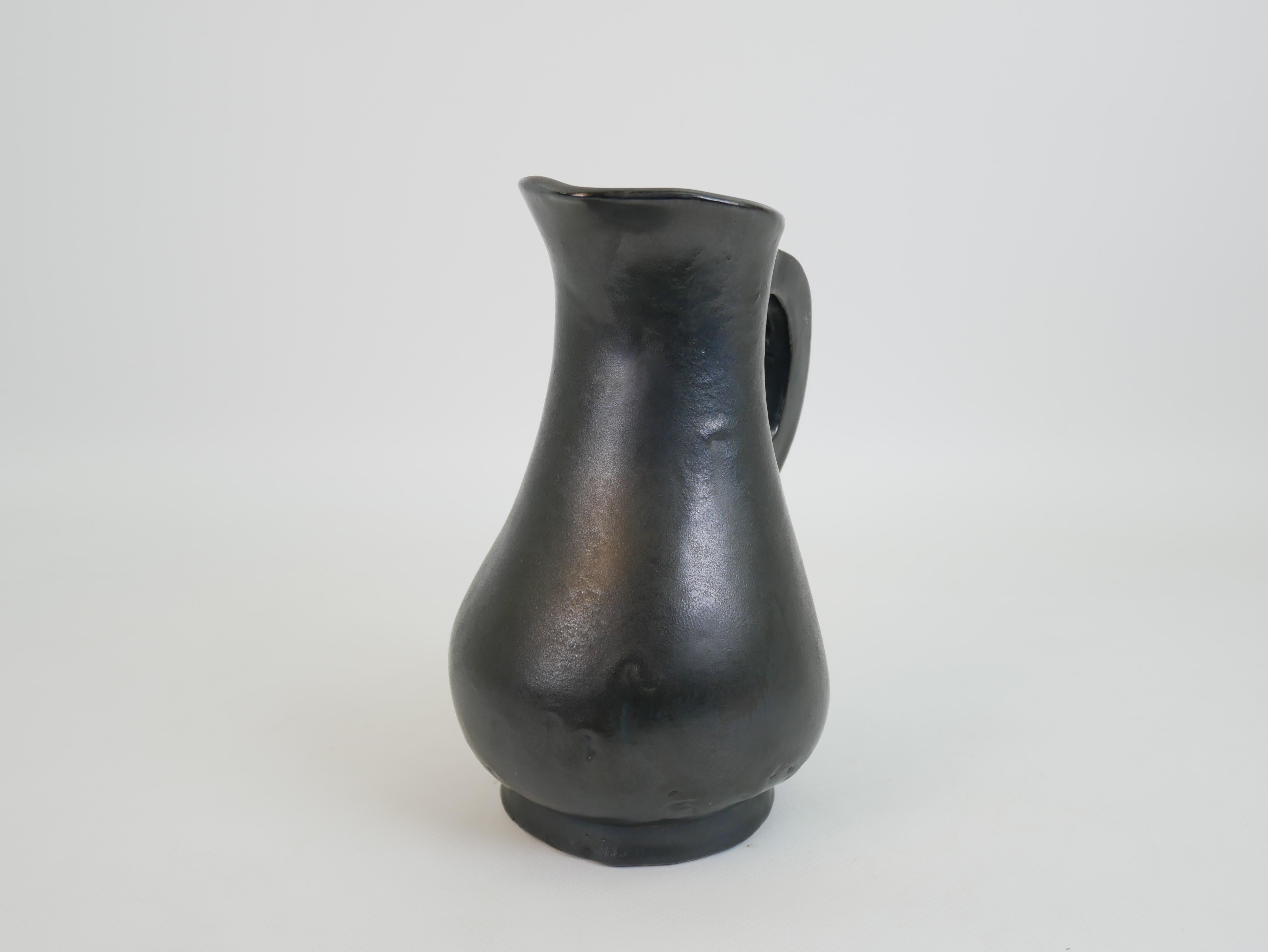 Mid-20th Century Stunning black ceramic pitcher in the style of Georges Jouve circa 1950 For Sale