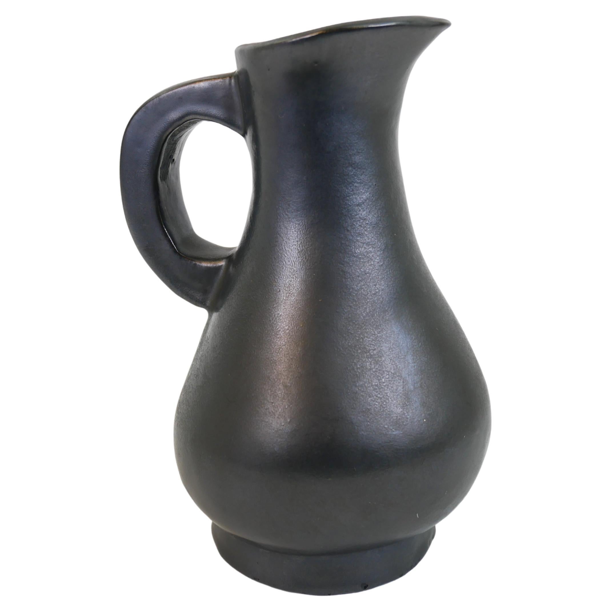 The Stunning black ceramic pitcher in the style of Georges Jouve circa 1950 (pichet en céramique noire dans le style de Georges Jouve)