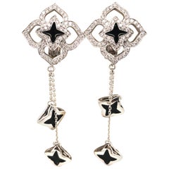 Stunning Black Enamel and Diamond Flower Earrings Set in 18 Karat White Gold