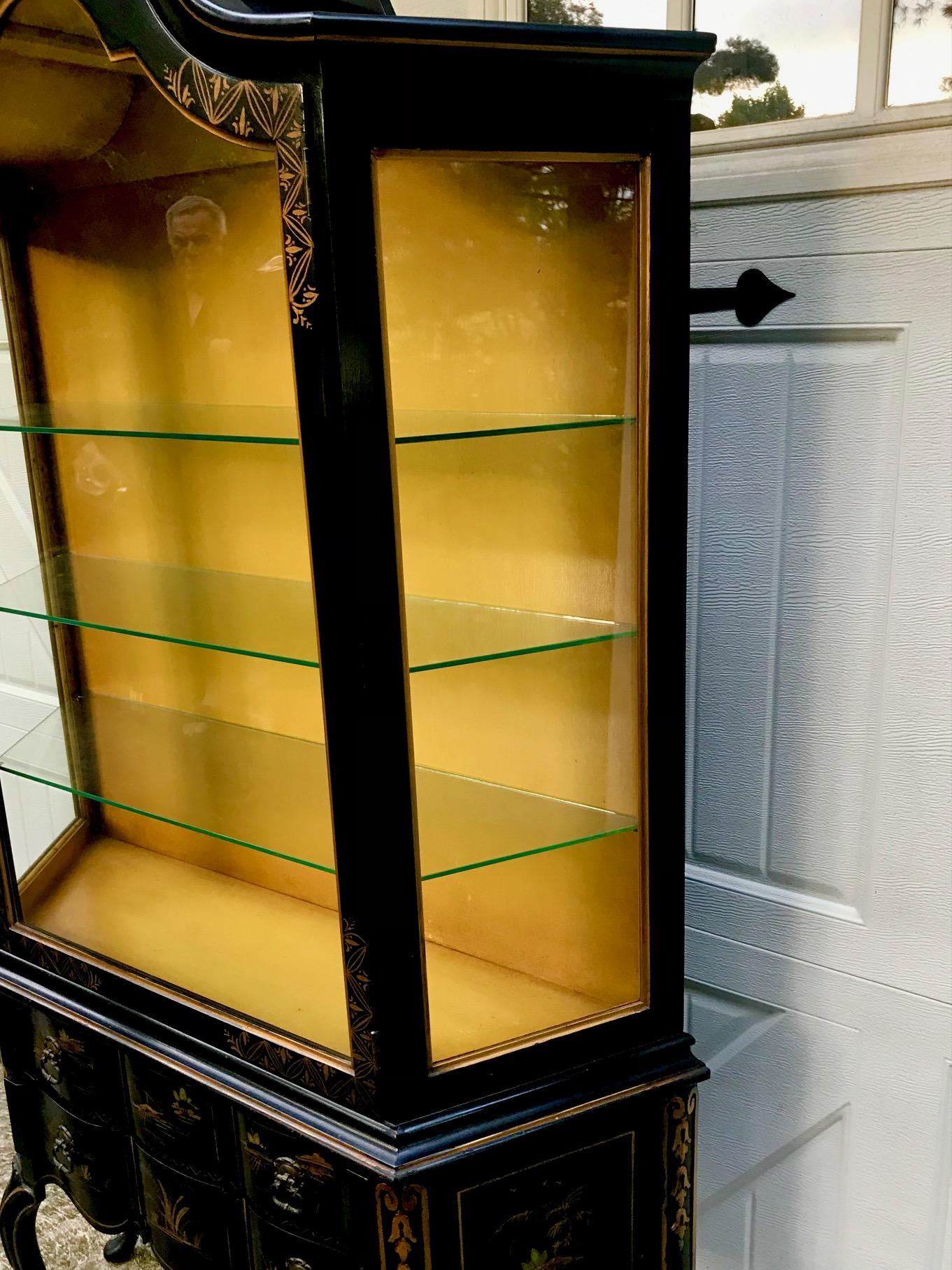 black and gold display cabinet