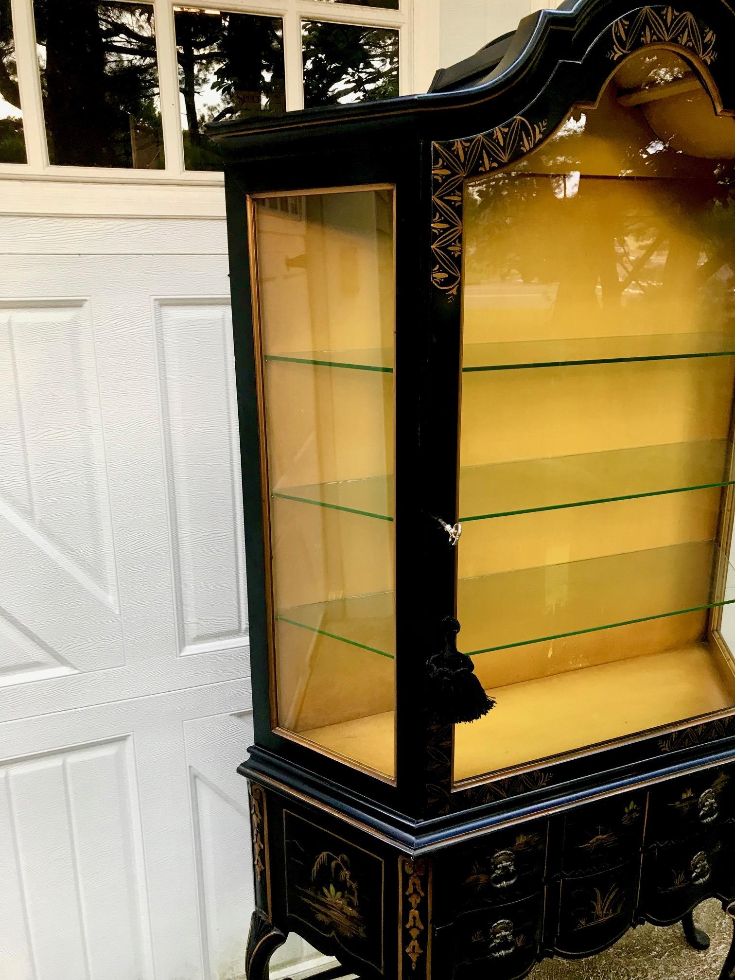 gold curio cabinet