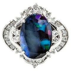 Splendido anello con opale nero e diamanti in platino