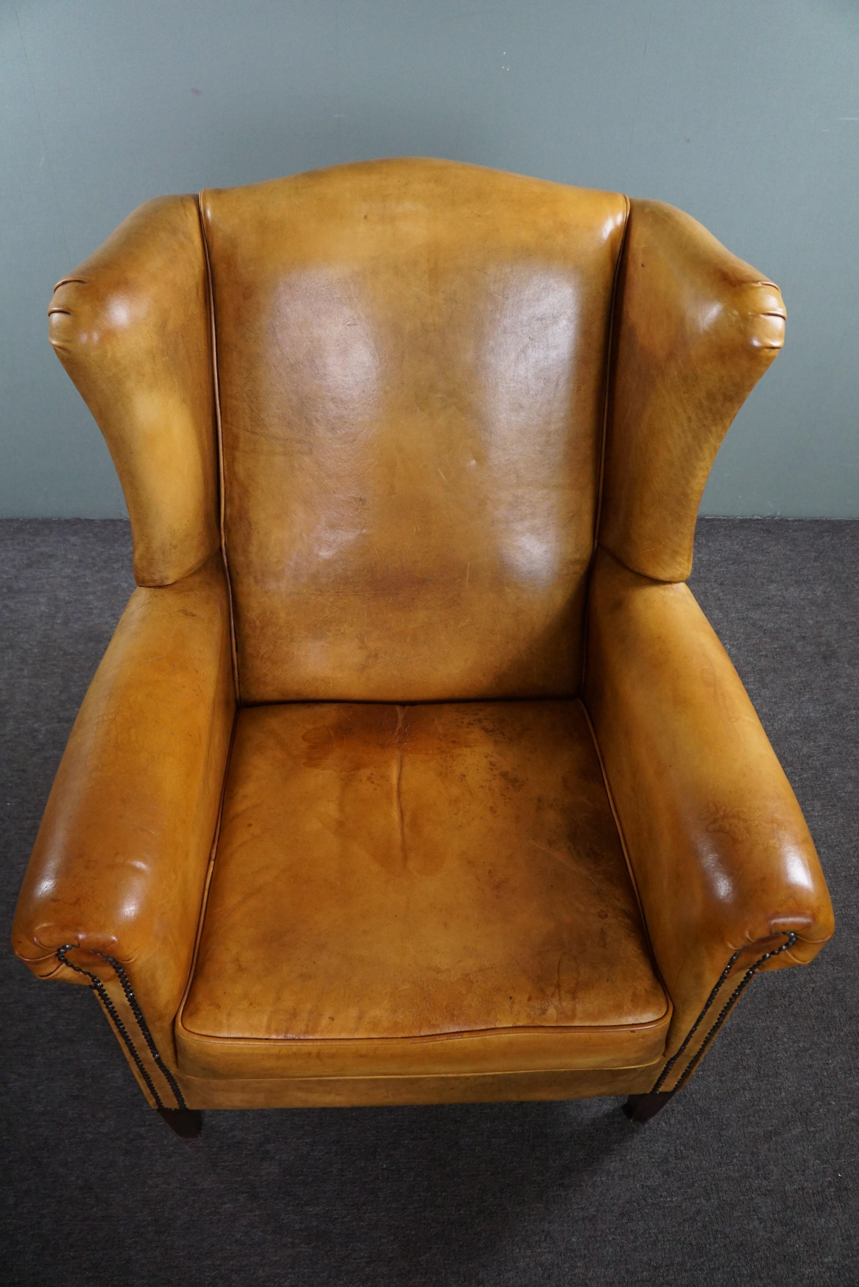 Cowhide Stunning blonde cowhide leather wing chair For Sale