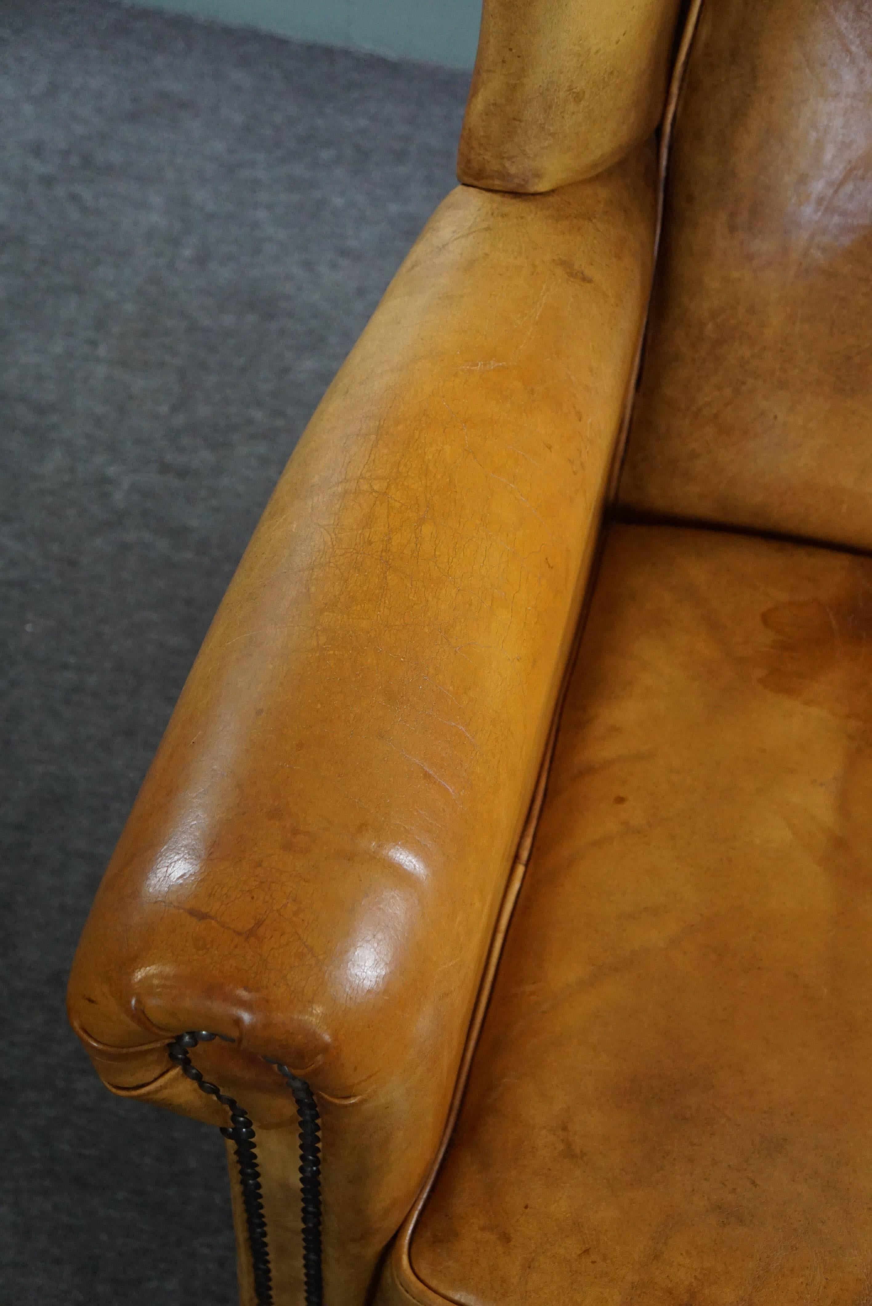 Stunning blonde cowhide leather wing chair For Sale 1