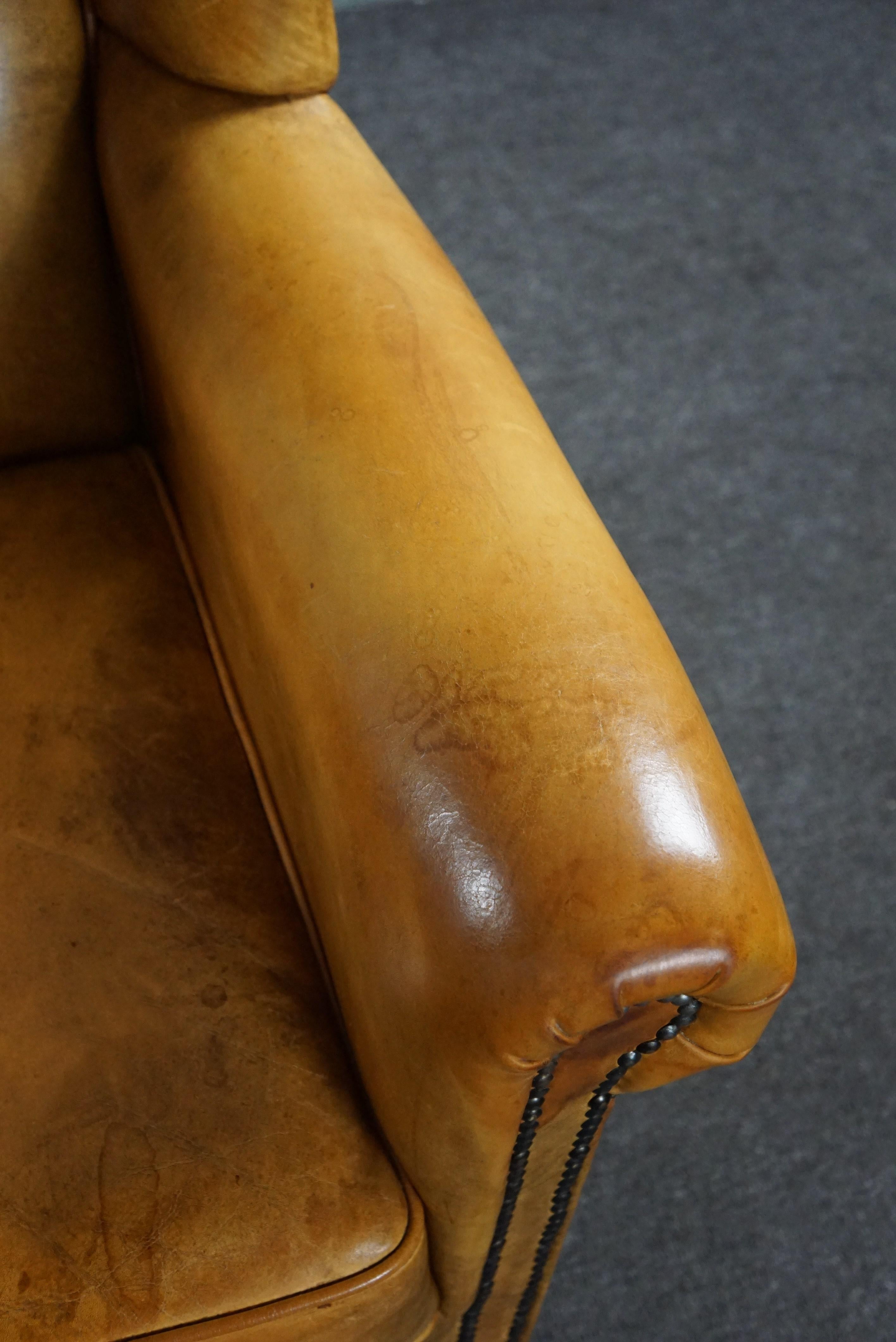 Stunning blonde cowhide leather wing chair For Sale 2