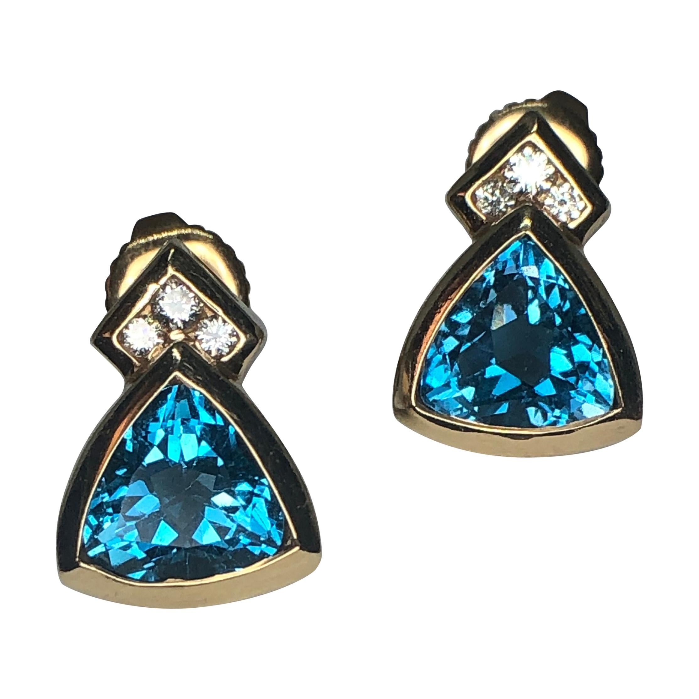 Stunning Blue Topaz and Diamond Earrings in 14 Karat Yellow Gold For Sale