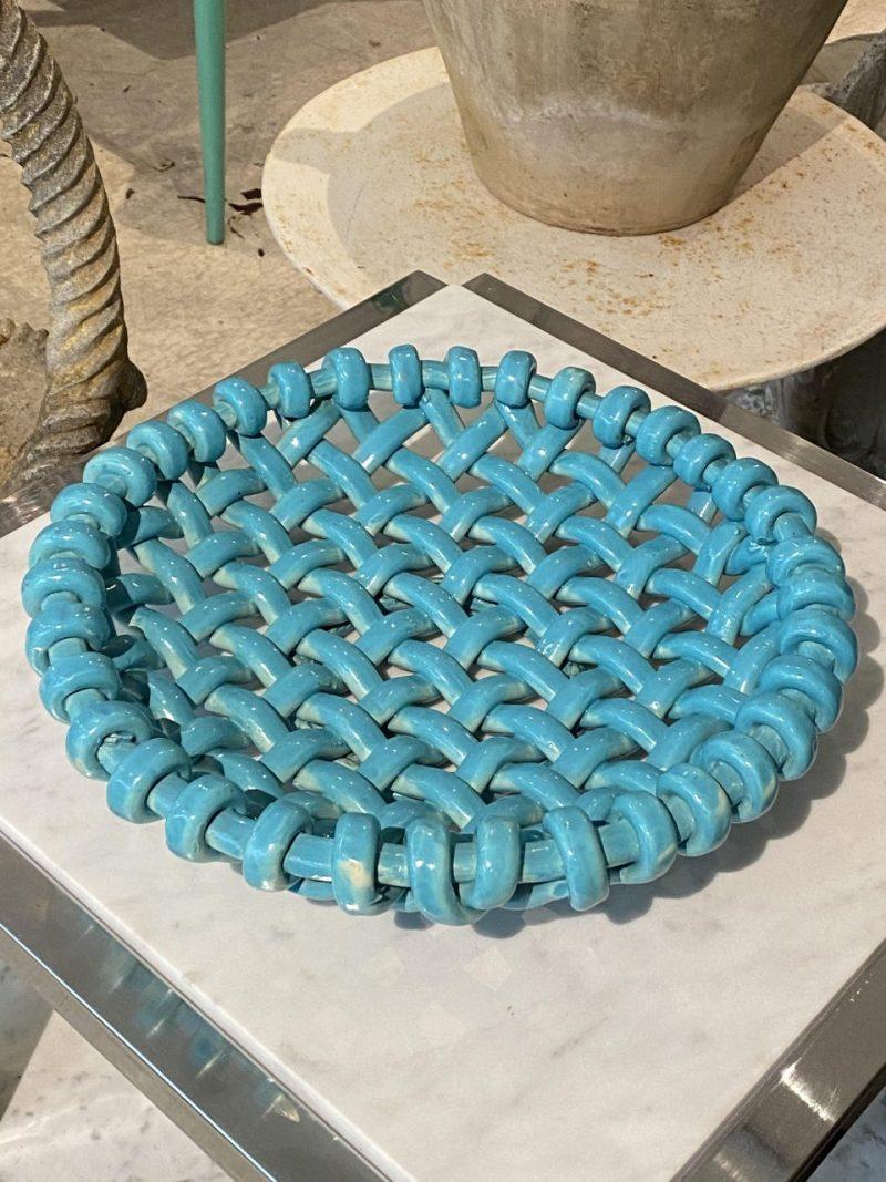 Large and gorgeous handmade ceramic fruit platter from mid-century France. This beautiful piece is formed in braided ceramic, and has a wonderful azure green/turquoise glaze. Designed by Jerome Massier for Vallauris in France.

A very elegant and