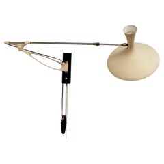 Stupenda applique da parete a braccio oscillante in ottone degli anni '50 di Cosack Leuchten