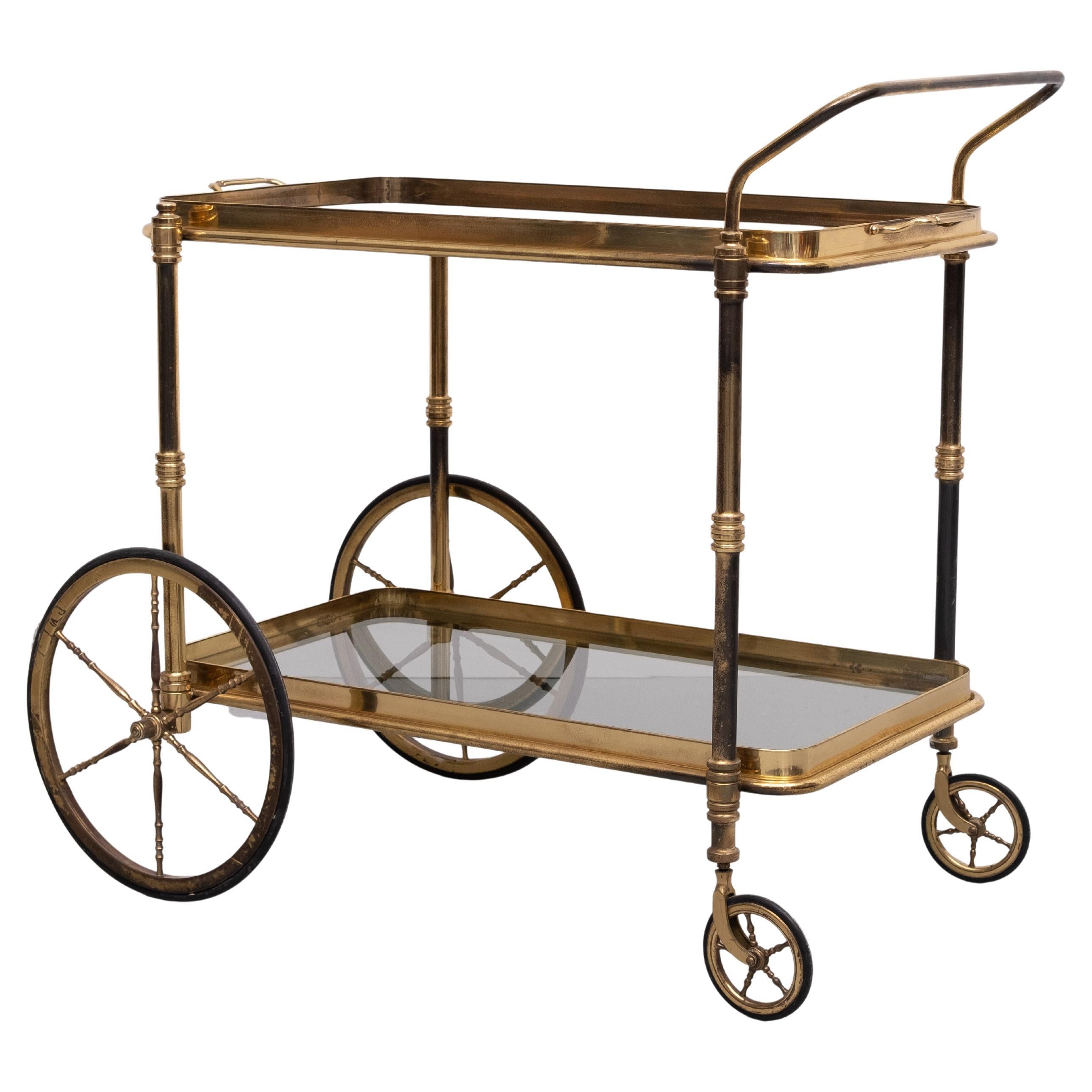 Stunning Brass serving Trolley . 1950s The top Tray is loose . 
Love the quality of this card .  and the superb patine . 
Great looking piece . 