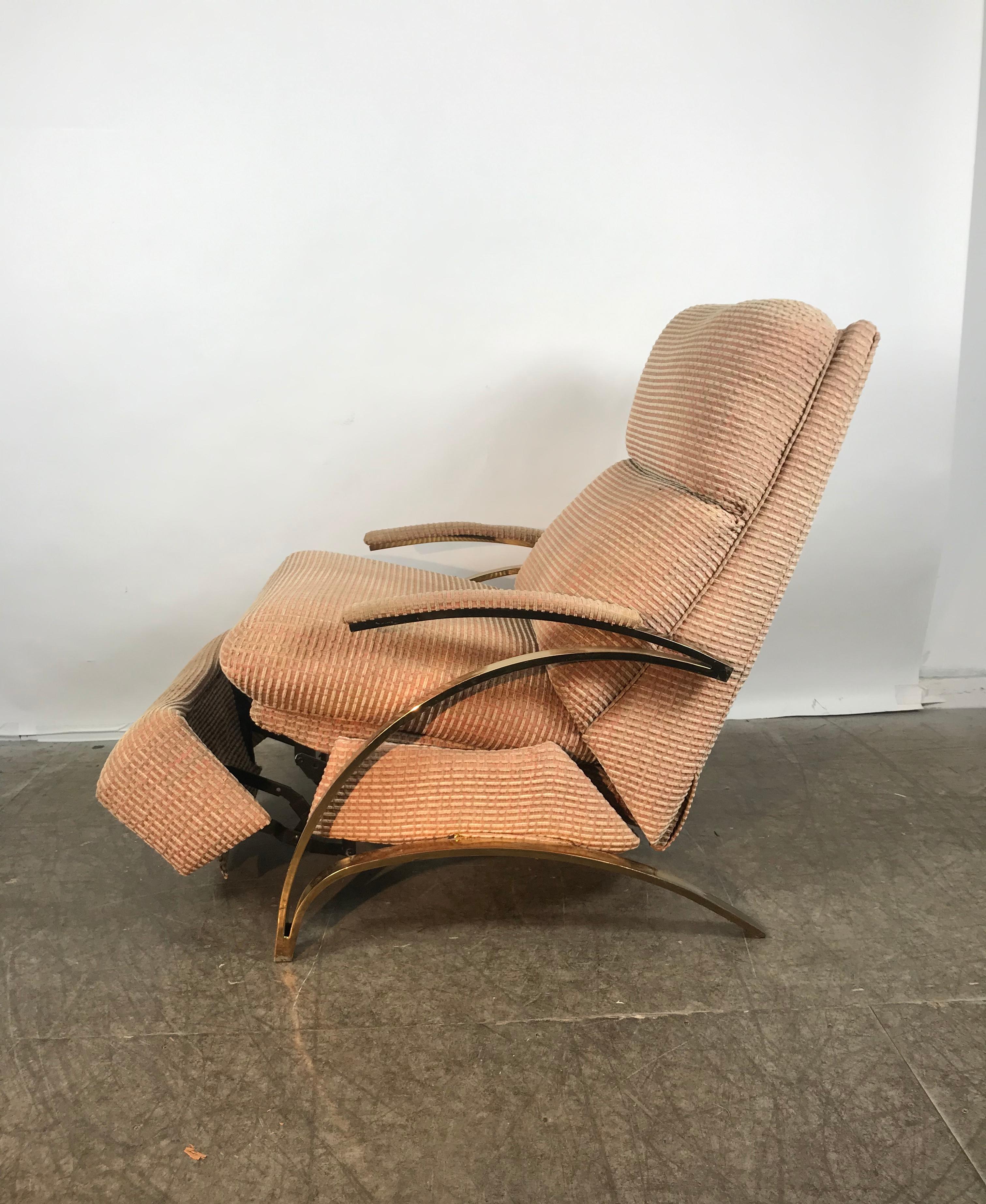 Stunning brass cantilever recliner lounge chair reminiscent of the designs
by Milo Baughman for Thayer Coggin, amazing quality, very heavy, nice original condition. Retains original fabric. Extremely comfortable. When fully reclined 66 by 28 inch