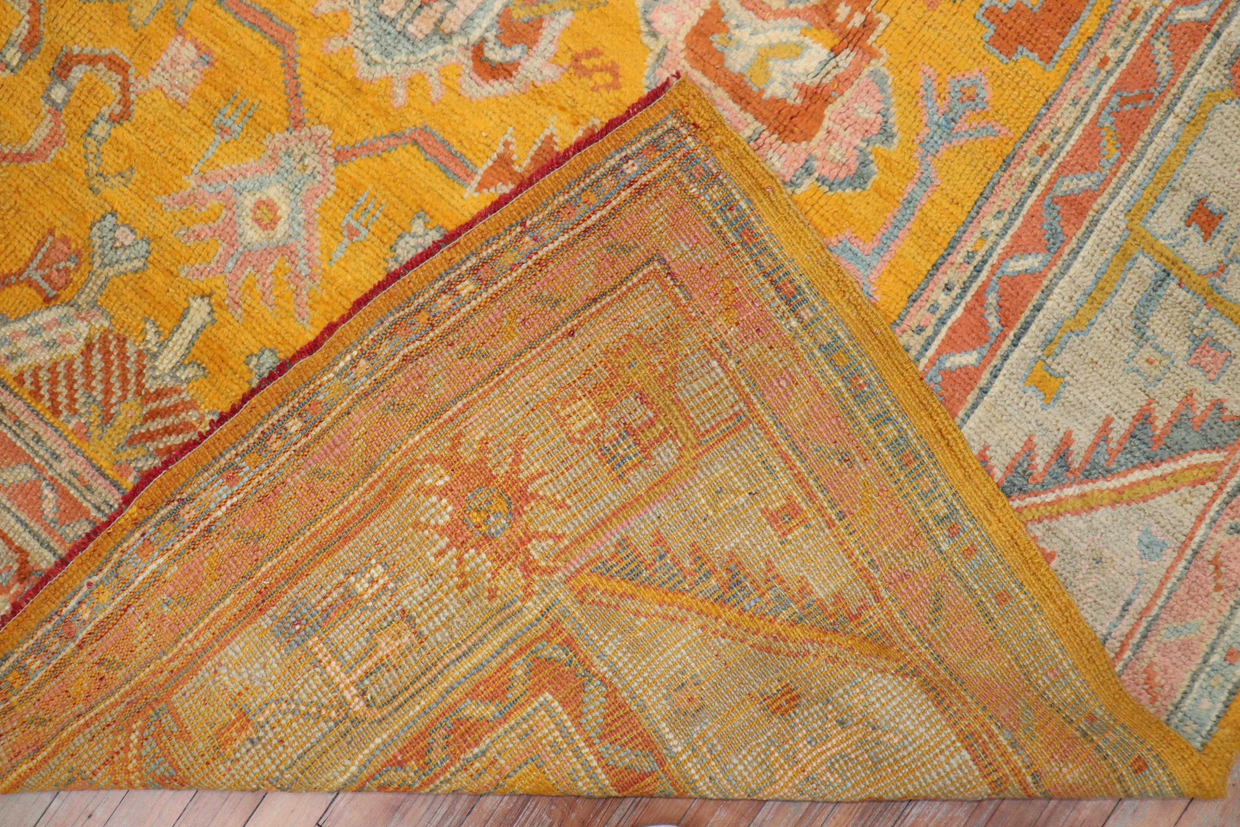 Stunning early 20th-century golden rod mango color antique Turkish Oushak rug in excellent condition

Measures: 7'1