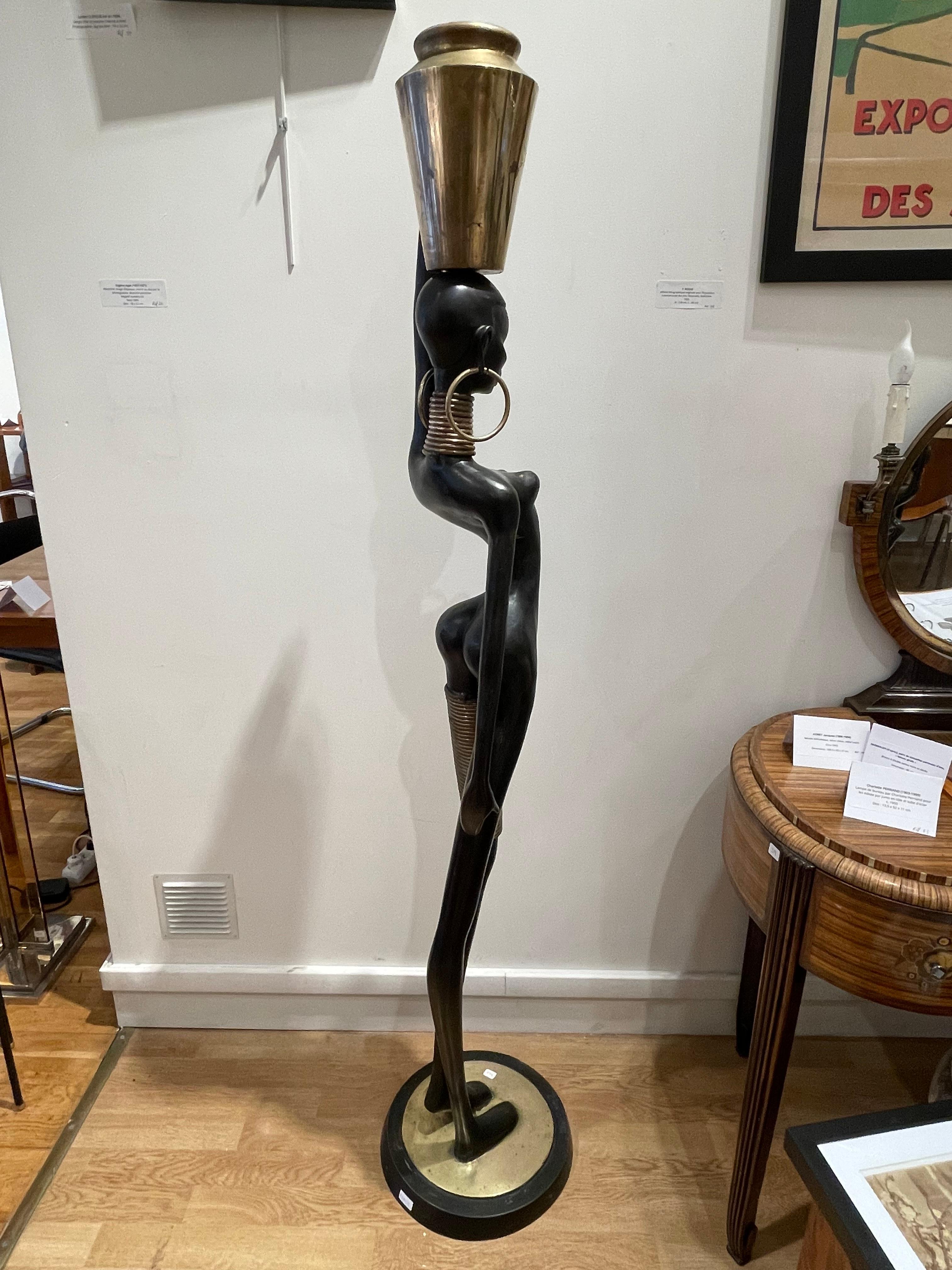 Austrian Stunning Bronze of an African lady carrying water, in the style of Karl Hagenaue For Sale