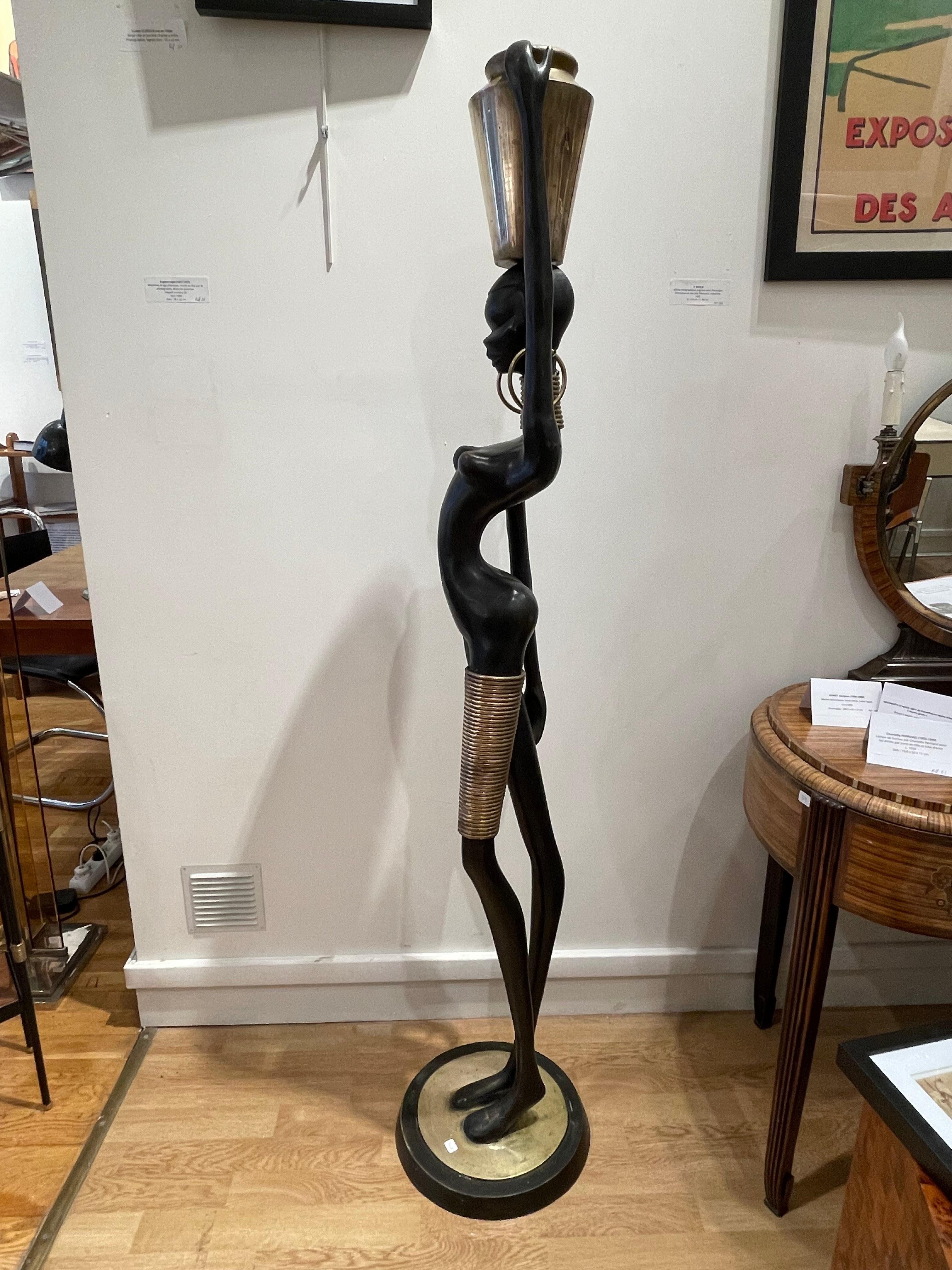 Late 20th Century Stunning Bronze of an African lady carrying water, in the style of Karl Hagenaue For Sale