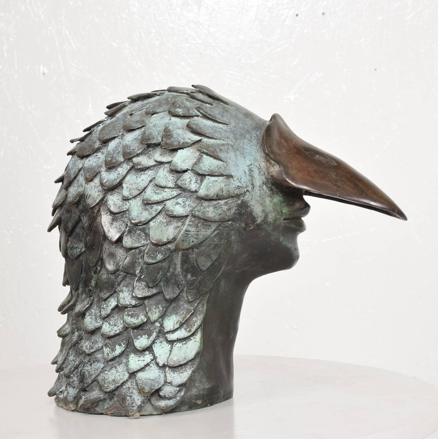 Stunning Brutalist bronze sculpture of the head of a bird-man.
Signed 