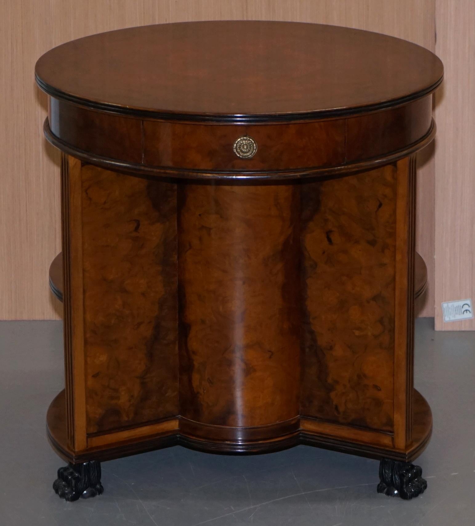 We are delighted to offer for sale this lovely handmade quarter cut burl walnut Regency style round bookcase table with single drawer and Lion Hairy Paw feet

A very good looking and rare piece of furniture, its not often you find a two tier