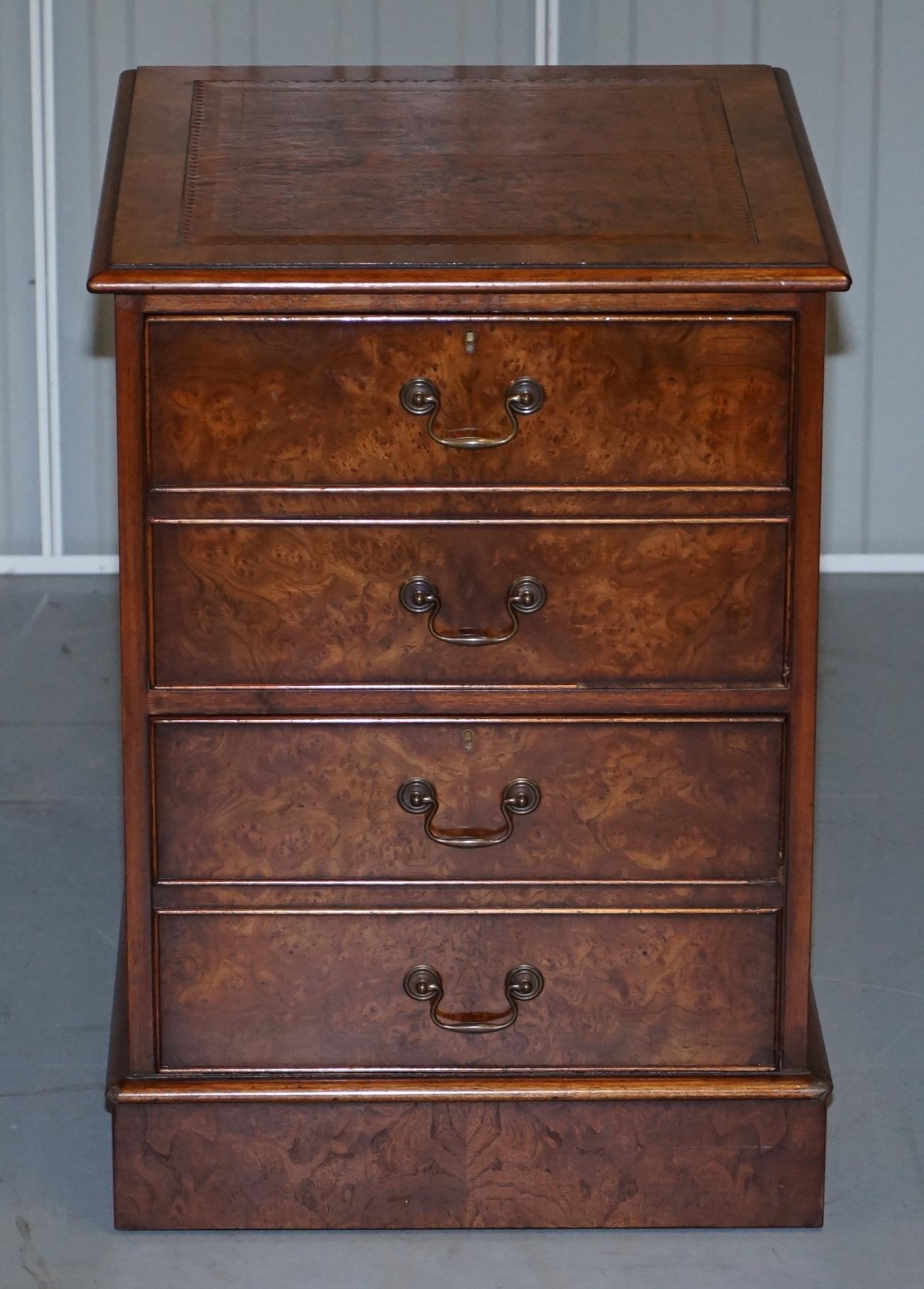 We are delighted to this lovely burr elm brown leather topped filing cabinet

In terms of condition we have deep cleaned hand condition waxed and hand polished it from top to bottom, there will be normal patina marks all-over from honest use and