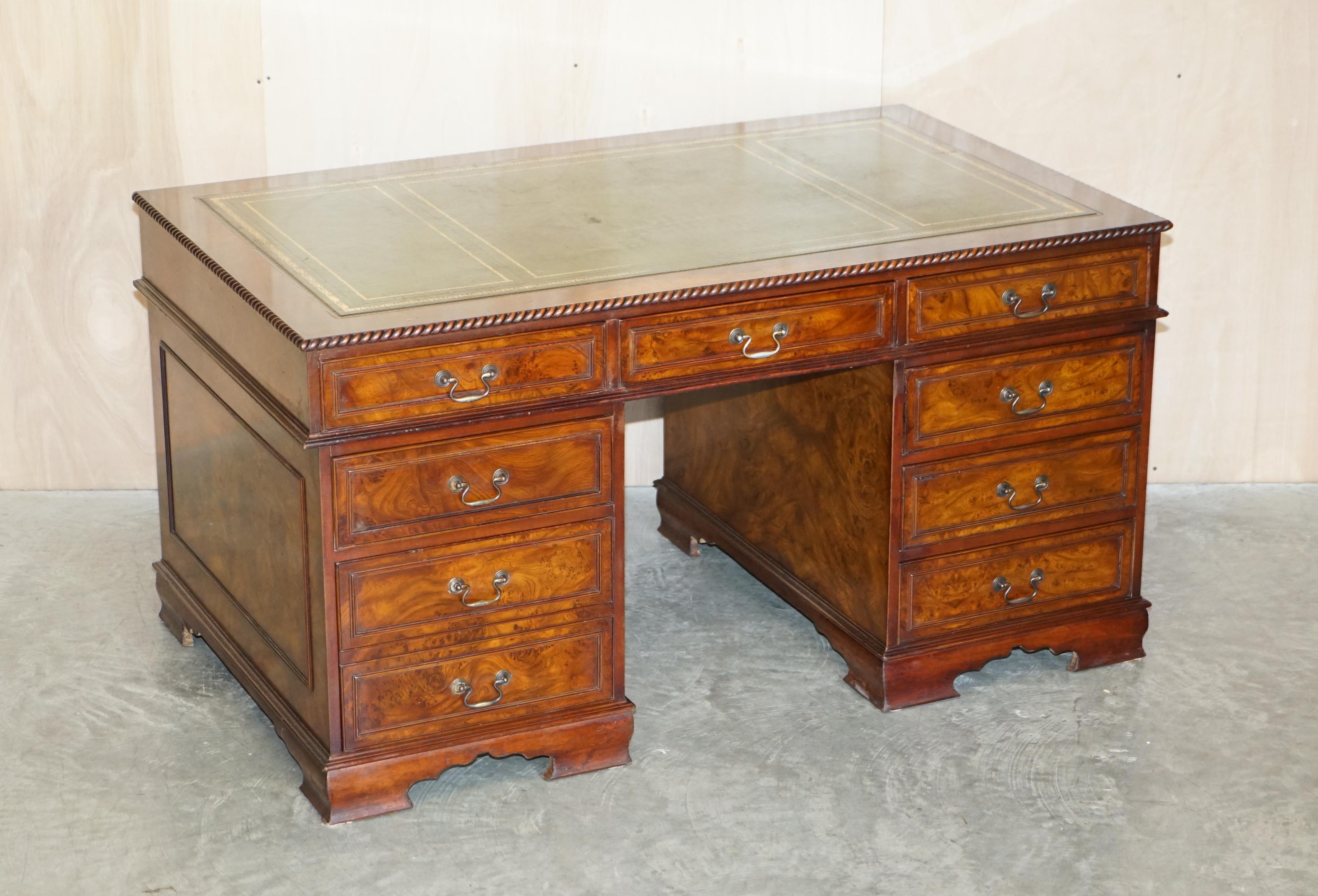 We are delighted to offer this lovely, very well made Burr Elm twin pedestal partner desk with gold leaf embossed green leather writing surface which is part of a suite

As mentioned this is part of a suite, I have in total the large partner desk,