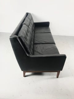 Stunning Button Tufted Leather and Walnut sofa by Gunlocke, Jens Risom Design