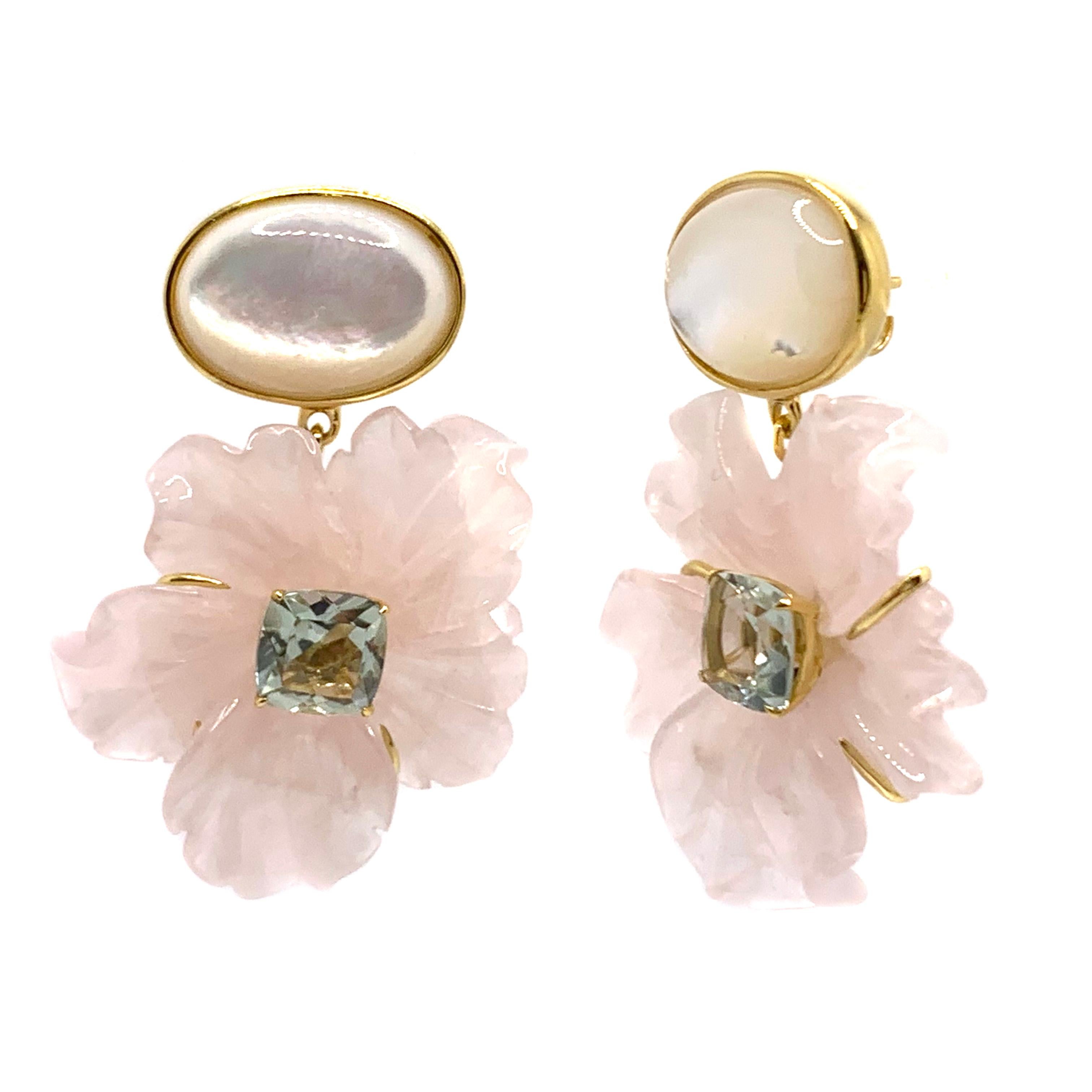 Stunning Cabochon Mother of Pearl and Carved Rose Quartz Flower Drop Earrings

This gorgeous pair of earrings features oval cabochon-cut mother of pearl and beautifully 3D carved rose quartz flower with cushion-cut green amethyst in center, handset
