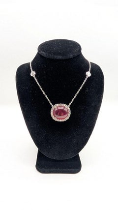 Stunning Cabochon Ruby Pendant in a Diamond Halo Setting