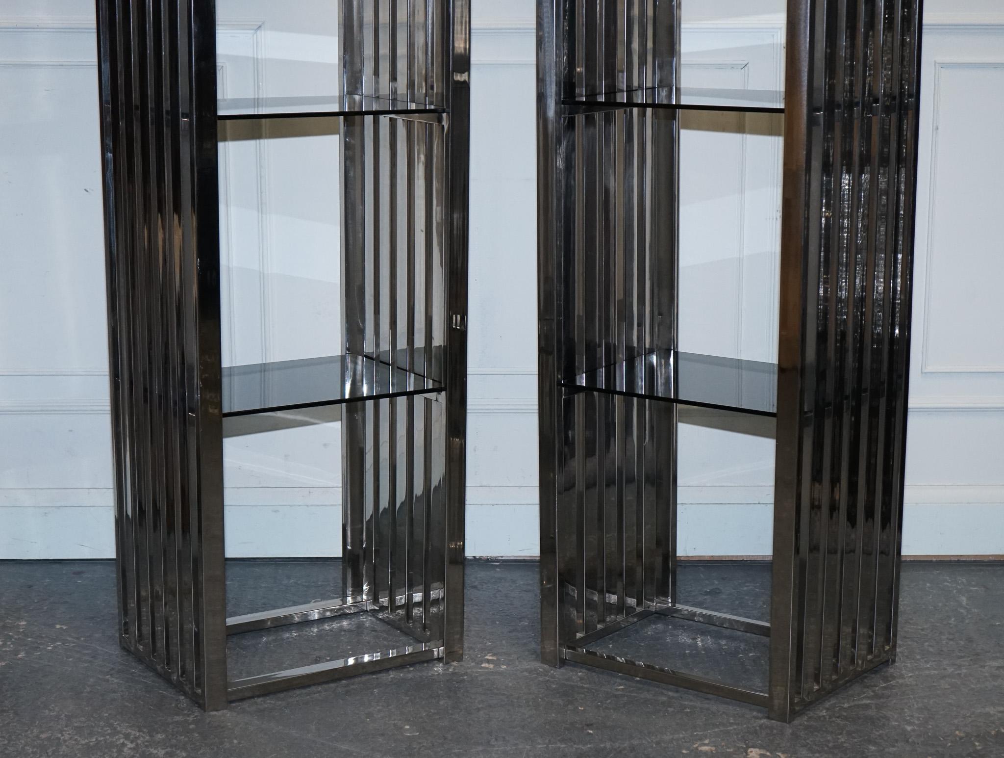 Hand-Crafted STUNNING CASA PADRINO STAINLESS STEEL PAiR OF BOOKCASES AND SMOKED GLASS SHELFS For Sale