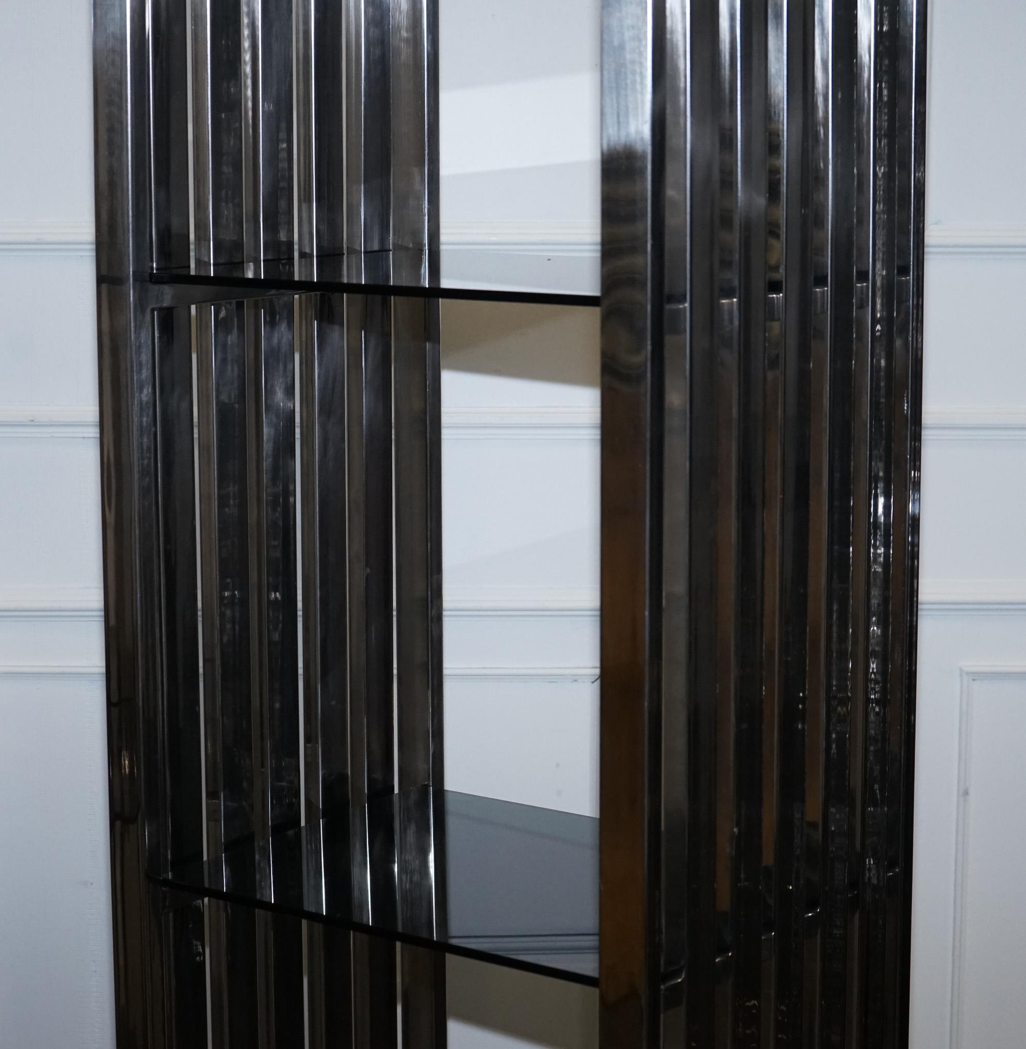 20th Century STUNNING CASA PADRINO STAINLESS STEEL PAiR OF BOOKCASES AND SMOKED GLASS SHELFS For Sale