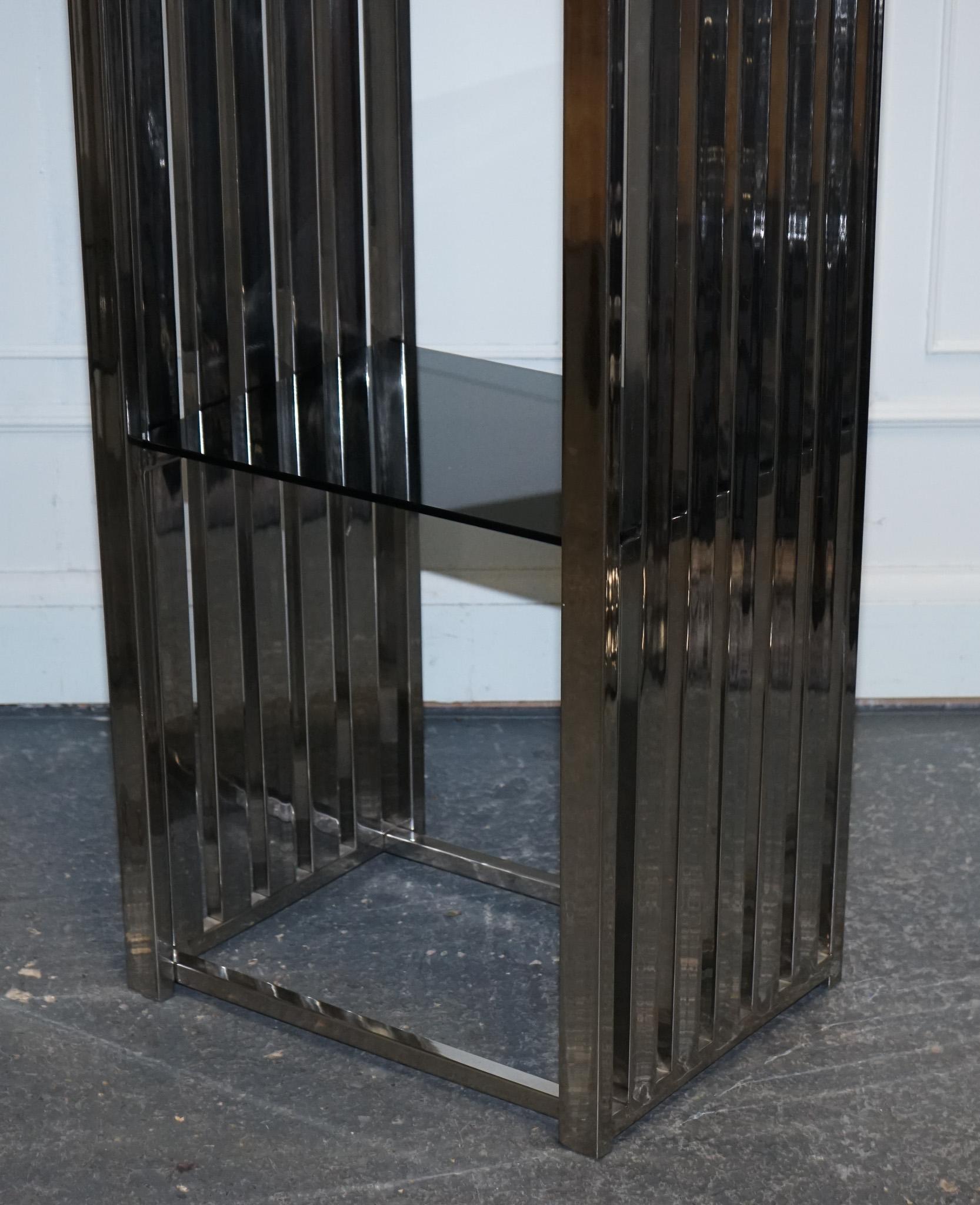 Stainless Steel STUNNING CASA PADRINO STAINLESS STEEL PAiR OF BOOKCASES AND SMOKED GLASS SHELFS For Sale